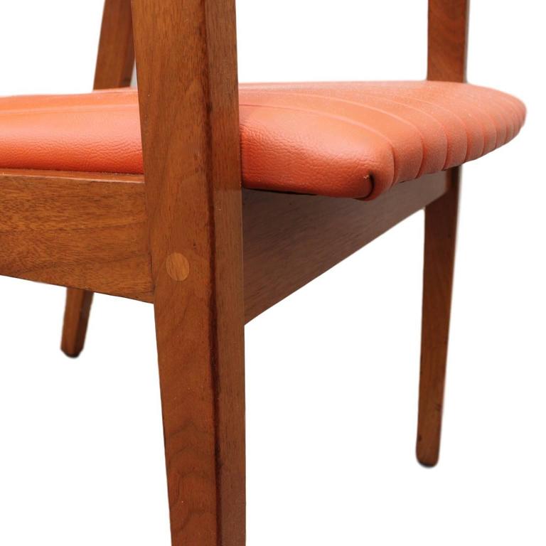 Set of Four MidCentury Modern Vinyl and Walnut Armchairs, the Marble