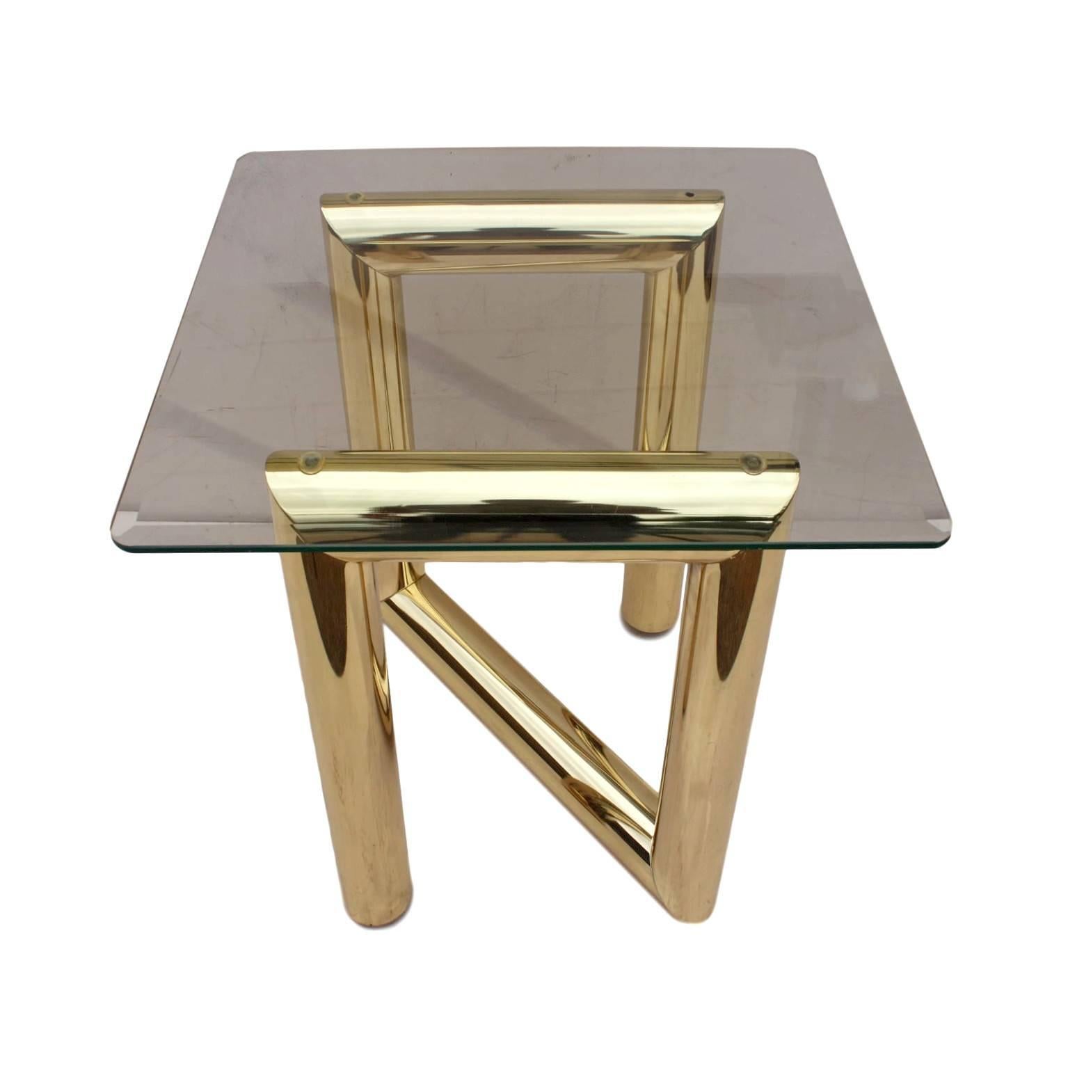 This tubular brass-lacquered and beveled-glass side table.  Table features:

3