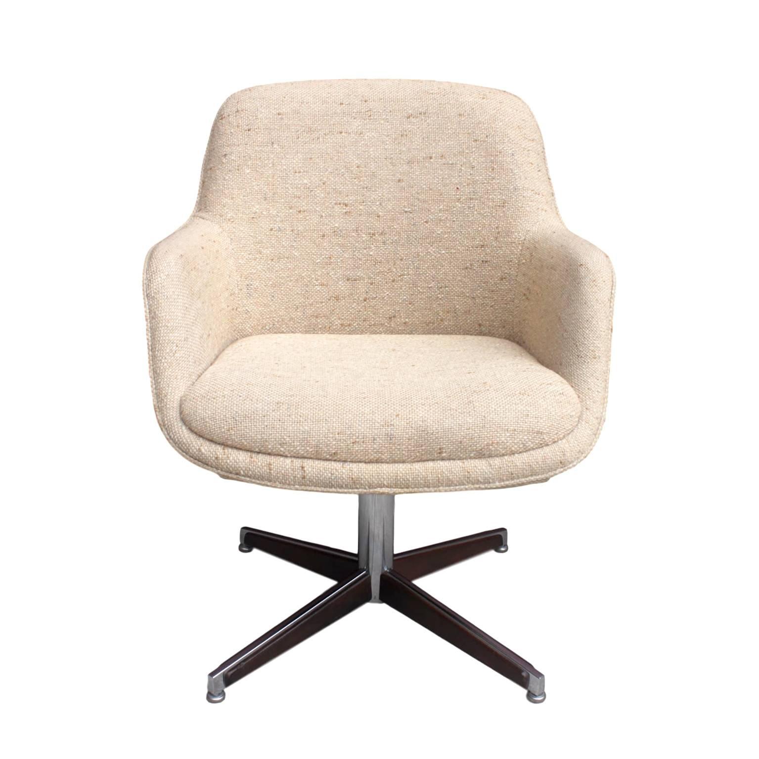 This great little desk chair features a Classic Mid-Century shape with original cream tweed upholstery. Base is chrome steel with unique solid walnut side-mouldings. Great style and neutral color that can fit with any office!

FREE HOLIDAY SHIPPING