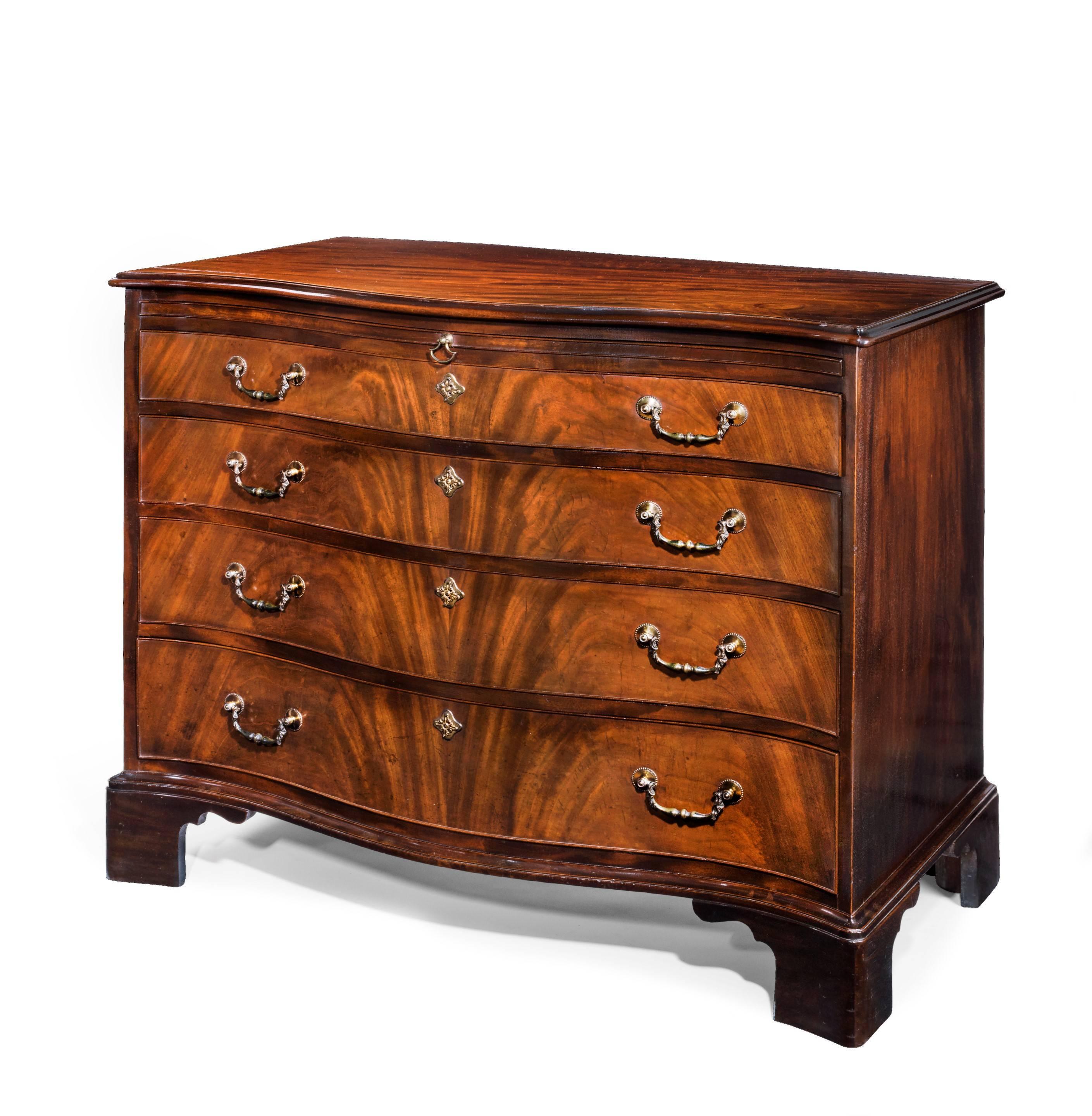 An important and rare George III period mahogany serpentine commode chest, attributed to Thomas Chippendale.

This is a very elegant and restrained chest, of particularly fine quality and in quite extraordinary condition; it glows with an