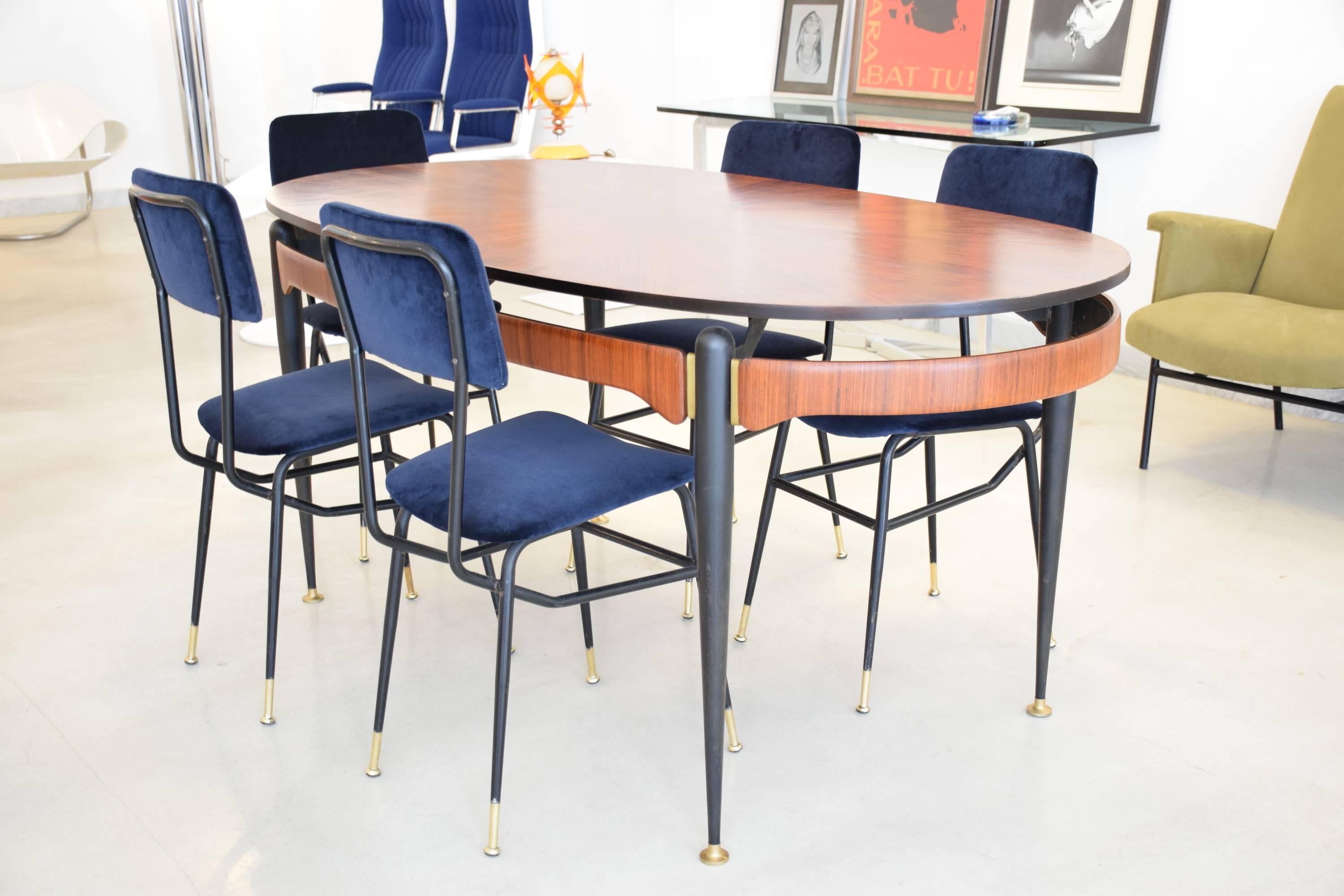 Set of six Italian 20th century vintage restored dining chairs by Studio BBPR designed with a graphic black lacquered steel structure and polished brass endings. Re-upholstered in a high quality Lelièvre Paris midnight blue velvet upholstery and new