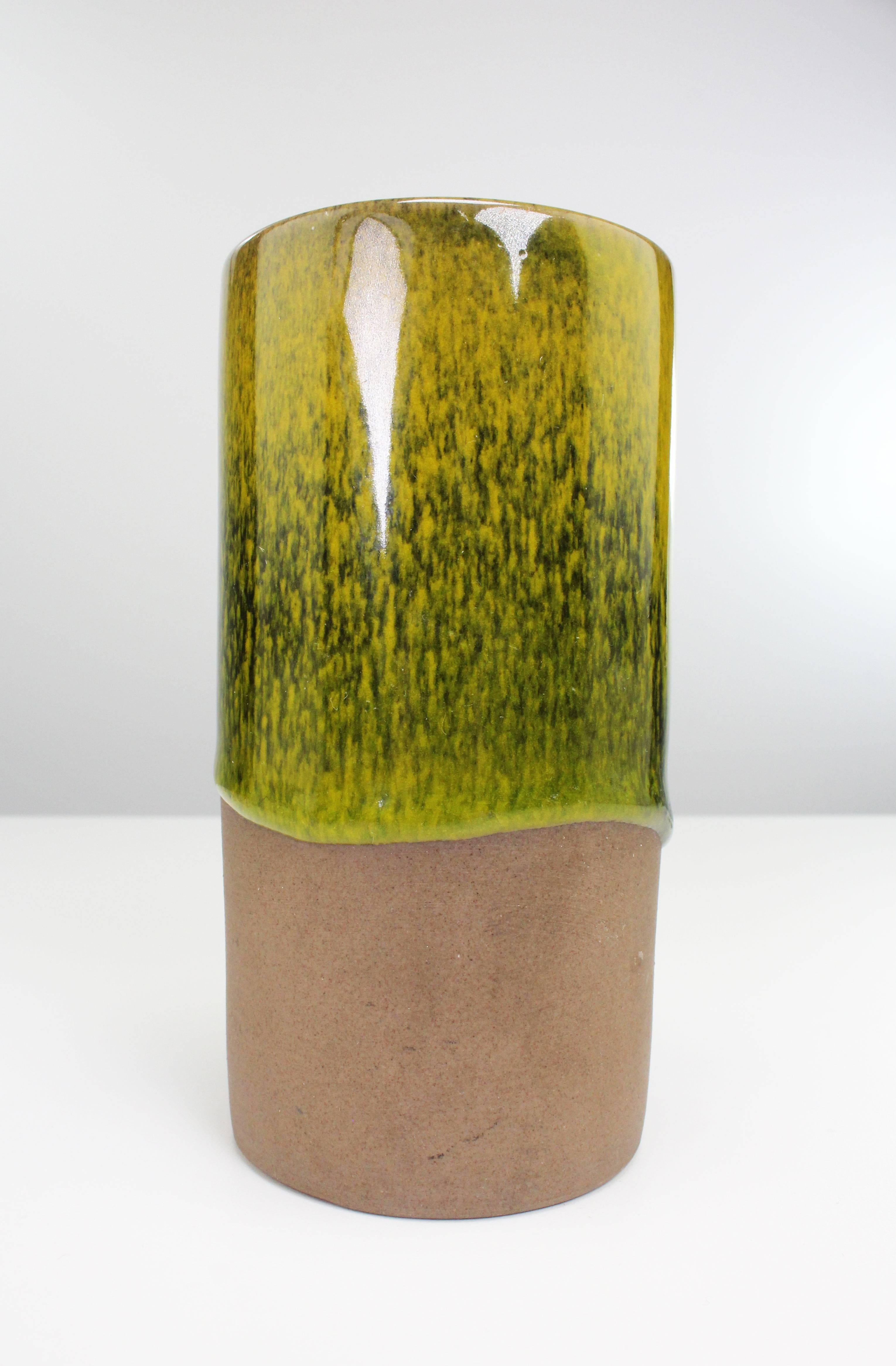 Scandinavian organic modern ceramic vase with smooth green and yellow glaze running down one side by Swedish designer Gunnar Nylund for Danish Nymølle Keramiske Fabrik in the 1960s. Stamped under base. Beautiful vintage condition.