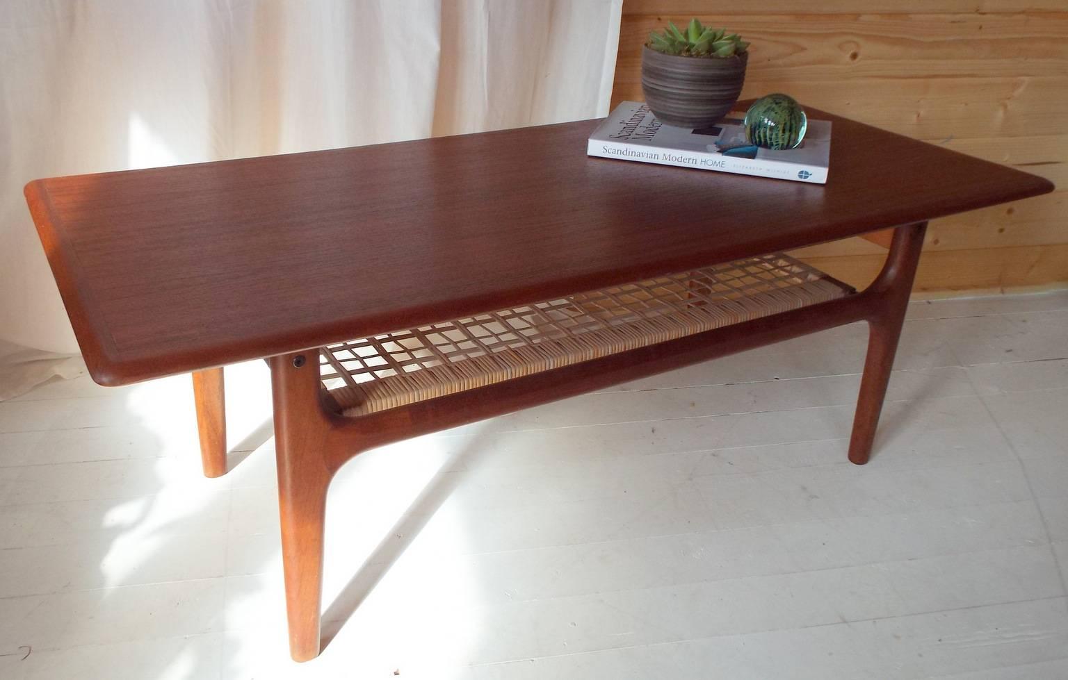 HC studio are pleased to offer this wonderful coffee table by esteemed manufacturers, Trioh of Denmark. Manufactured using teak, the sculpted frame is in lovely condition, with seamless joints and gently tapering legs that are the hallmark of high