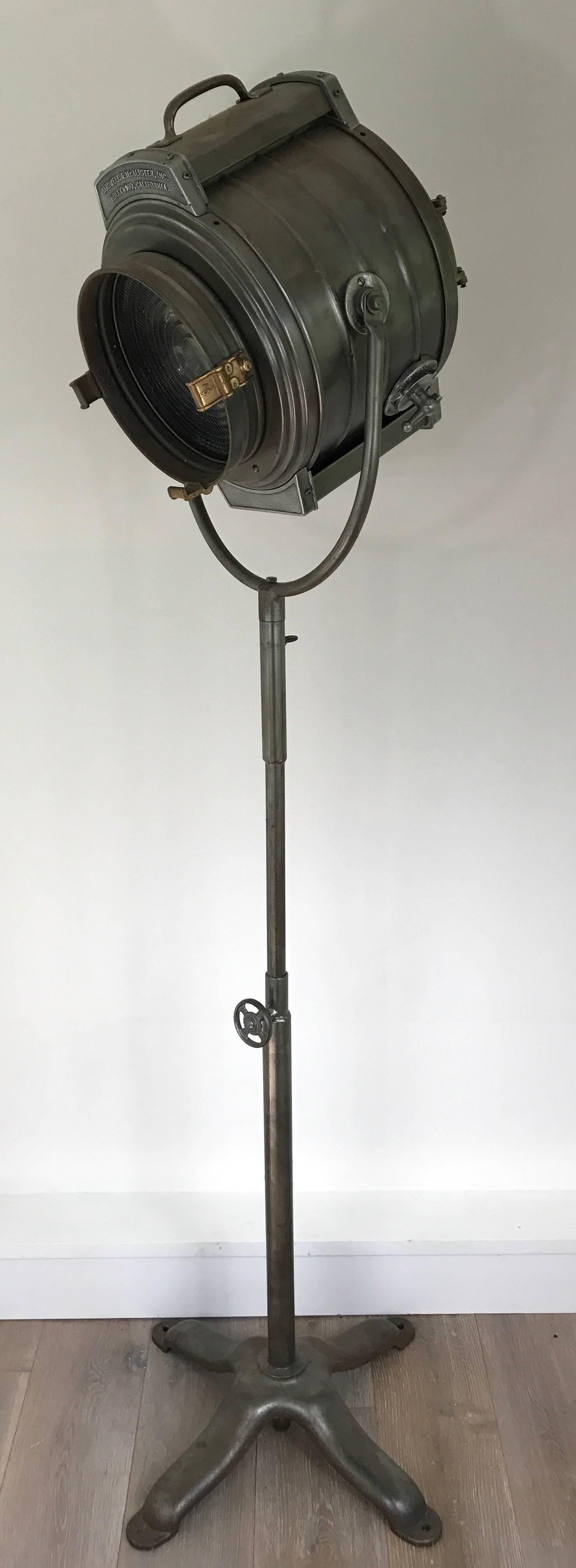 Restored Bardwell & McAlister studio spotlight. Mid-20th century, Hollywood. Adjustable height. Interior mechanism adjusts the strength of the light.