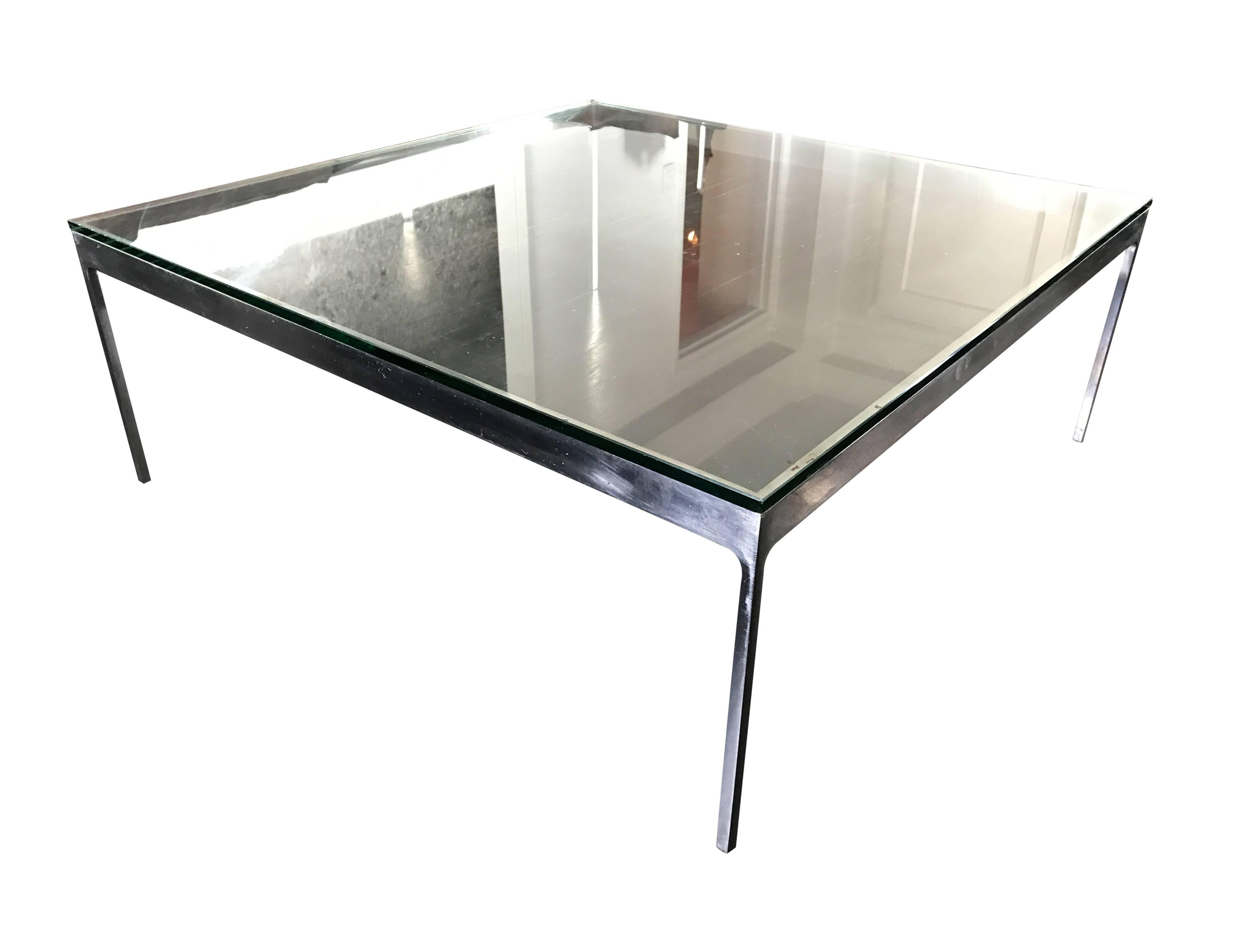 A large square stainless steel cocktail table by Nicos Zographos with thick 3/4