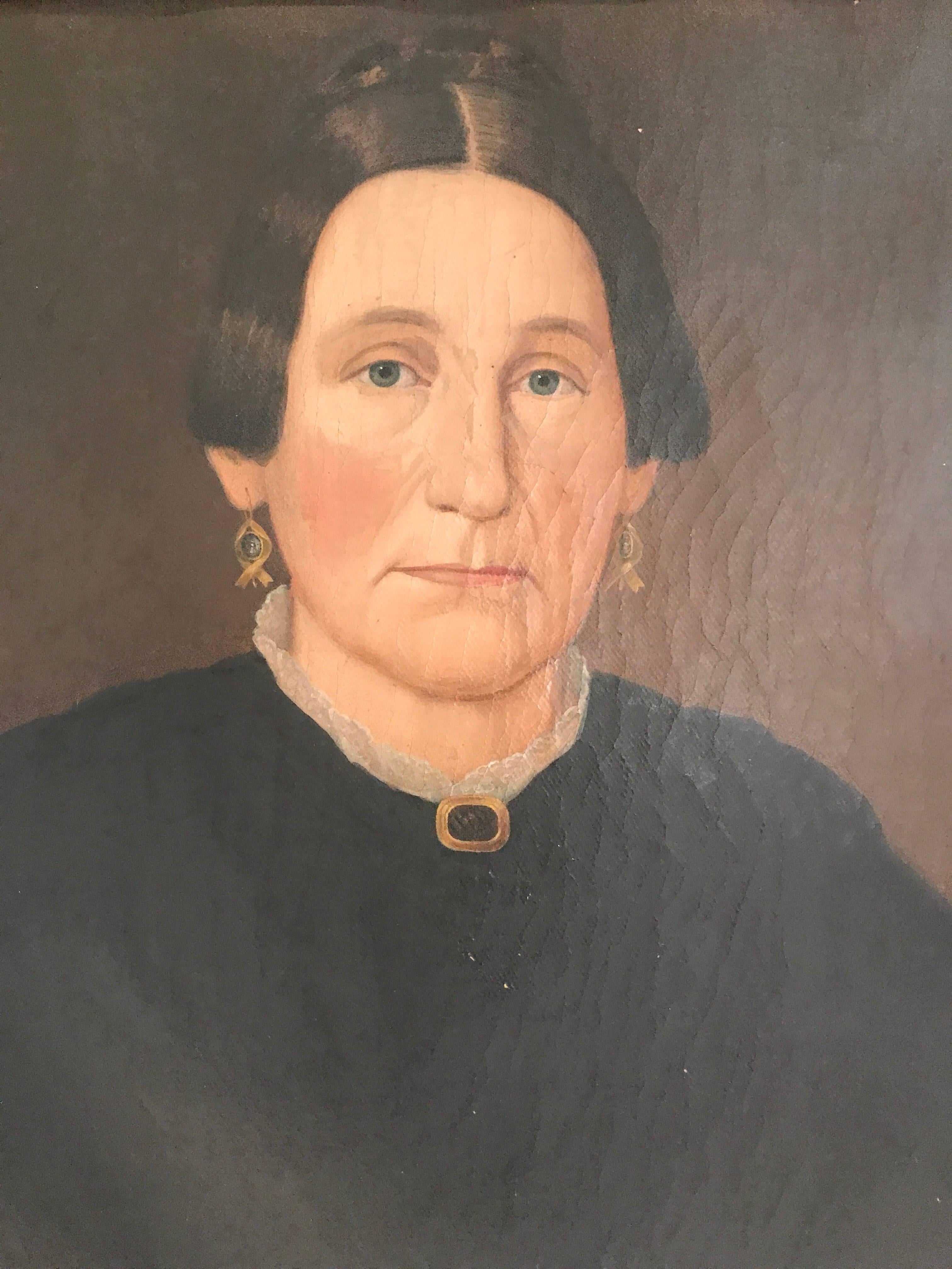 Huile sur toile de l'école américaine du XIXe siècle, portrait de femme dans un cadre doré. La toile mesure 25,5