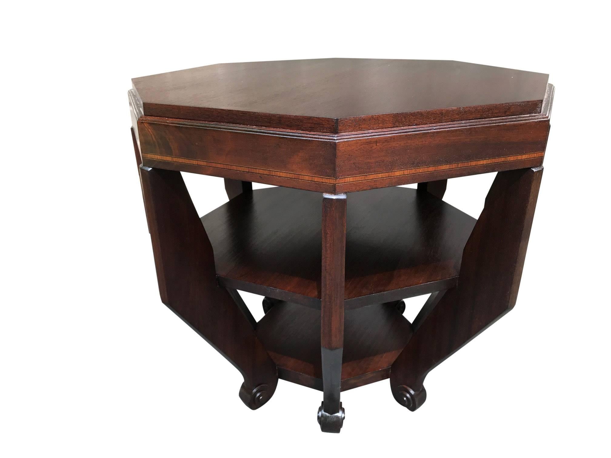 A fine period French Art Deco octagonal occasional table. Expertly refinished mahogany frame with satinwood inlay.