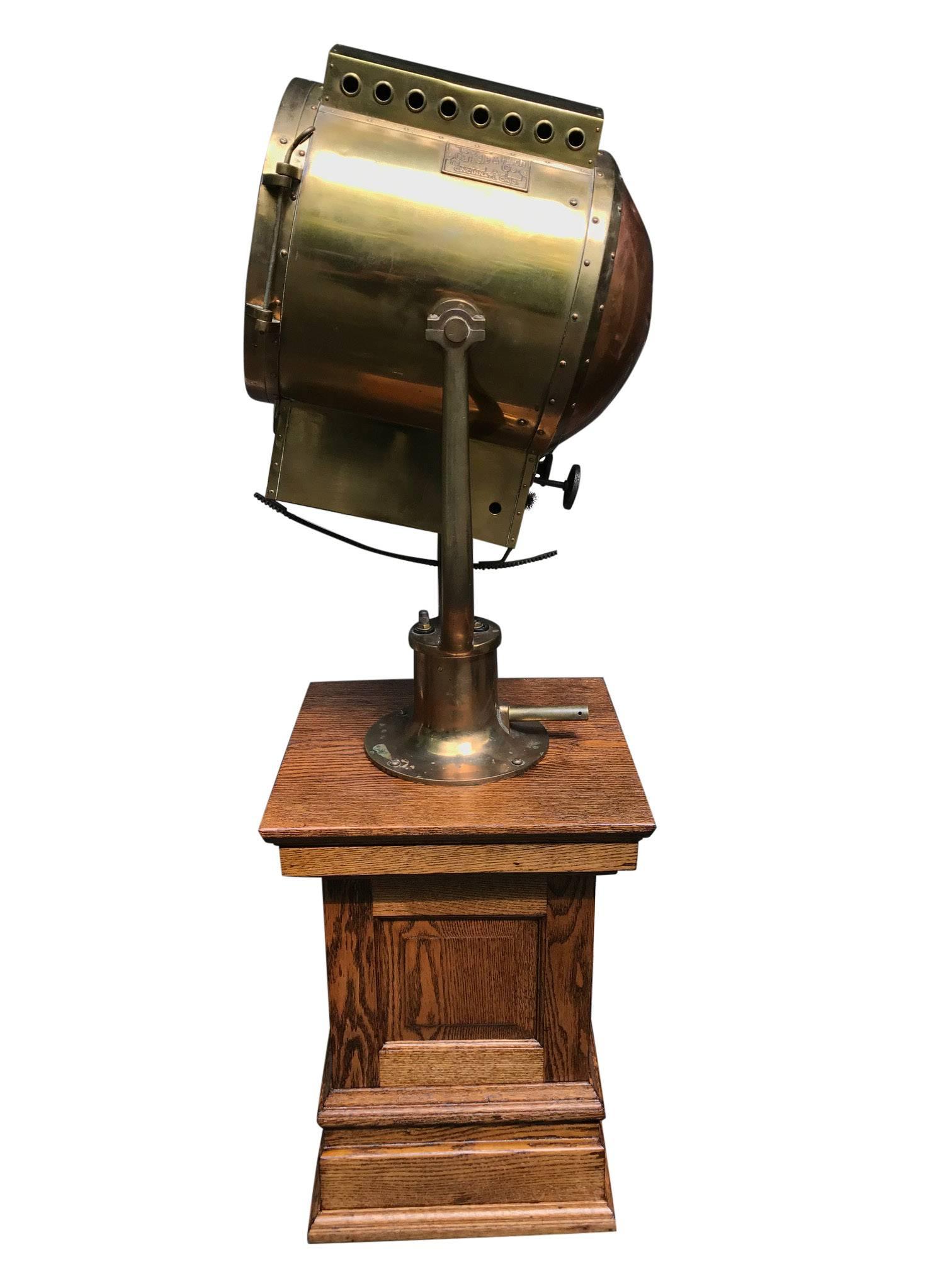 Massive brass and copper WWII ship searchlight by Carlisle & Finch. Rare condition and size. Interior mechanism and brass fixture adjust vertically and horizontally.