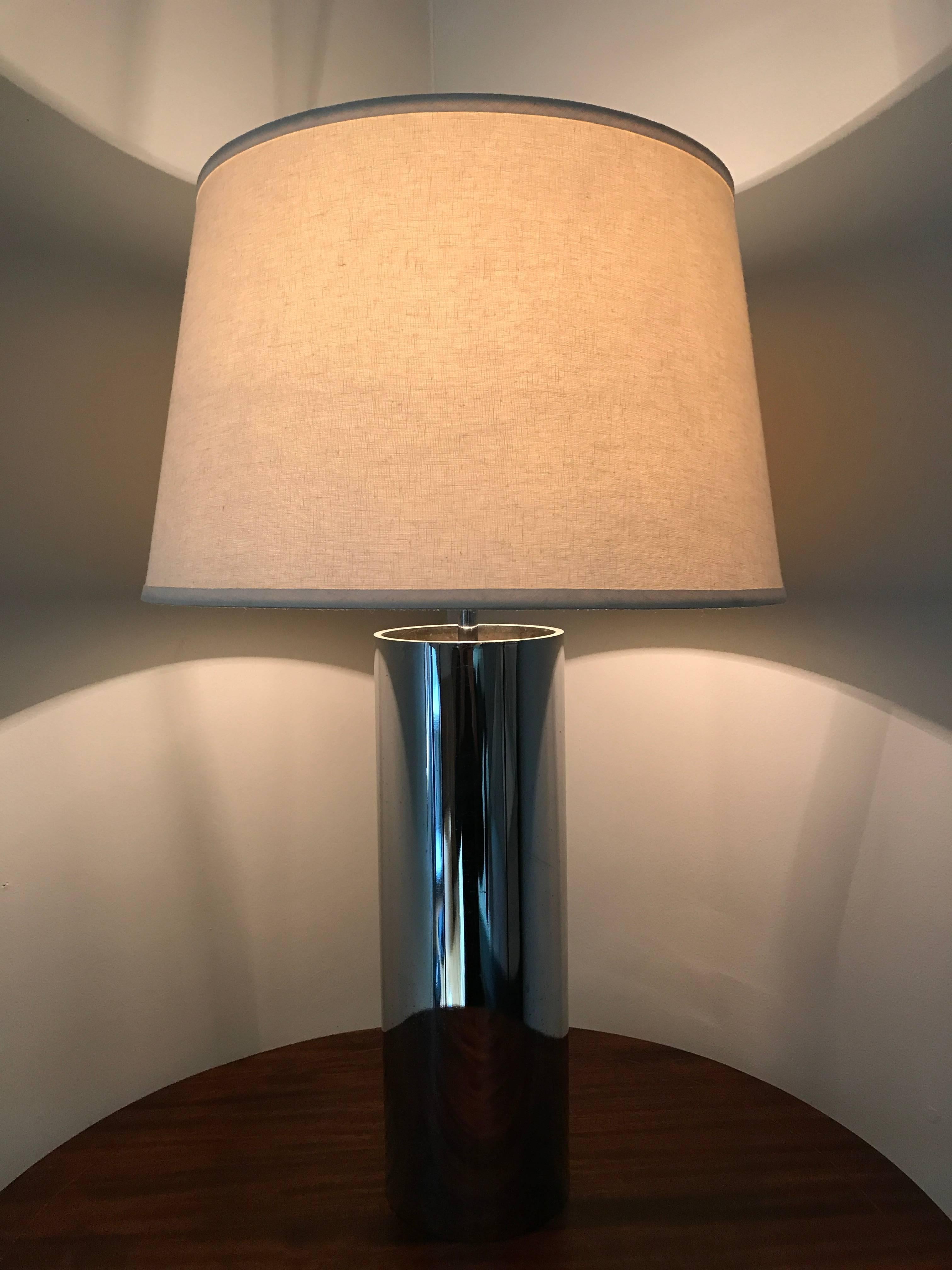 Mid-century chromed steel cylindrical table lamp. Heavy and solid construction. Shade for display purposes only.