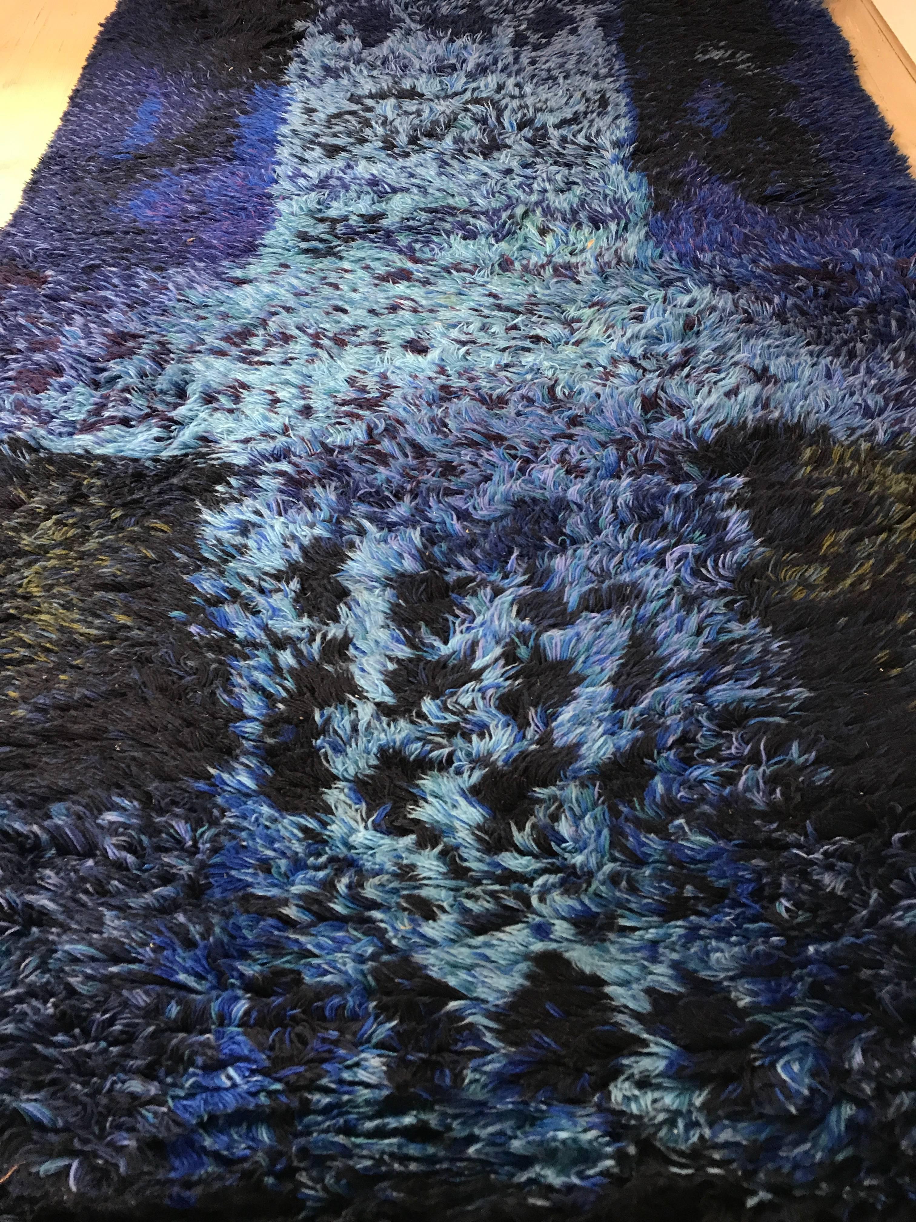 A blue Scandinavian Rya rug by Ritva Puotila. Excellent example with deep vibrant colors.