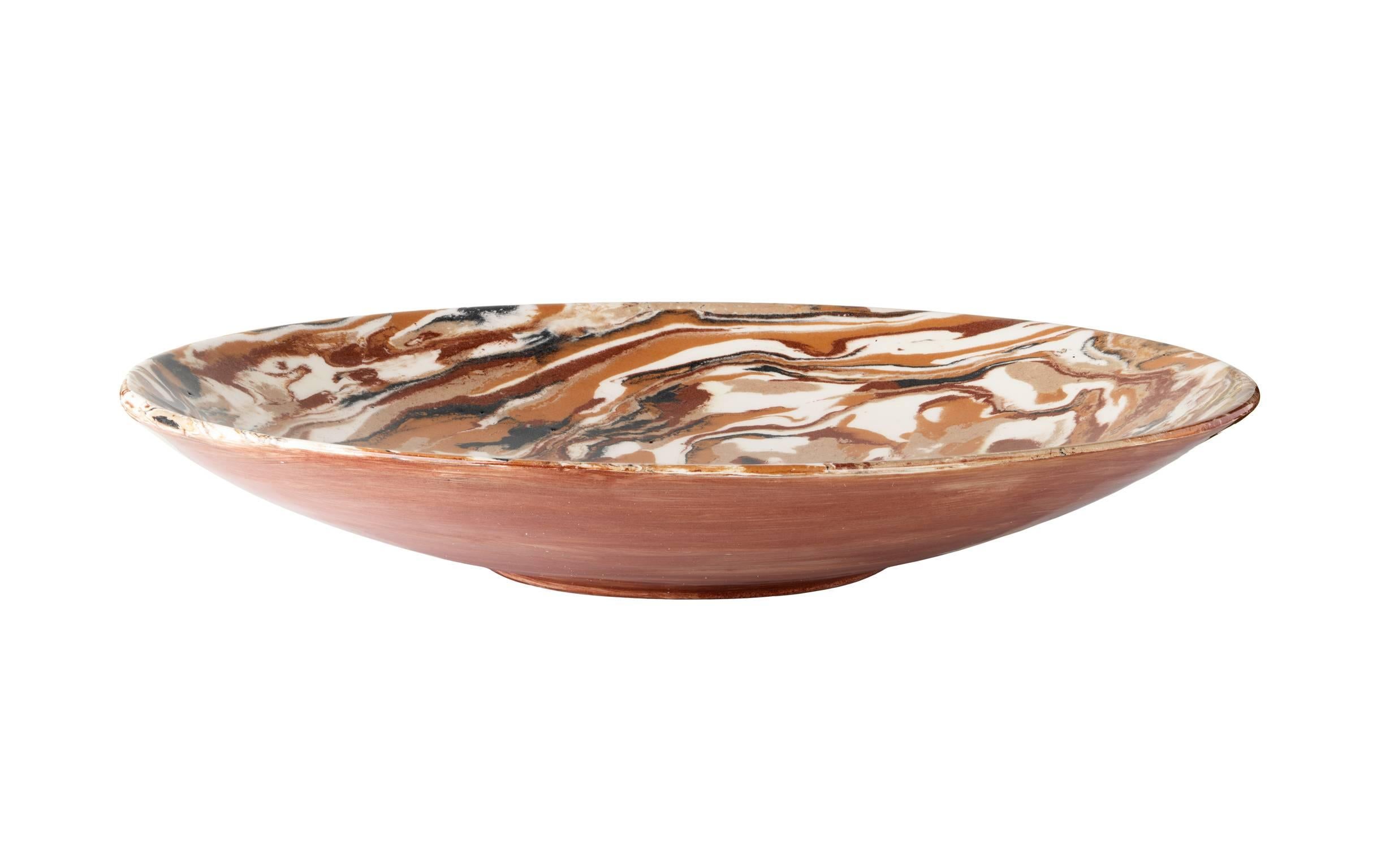 One of a kind cabana brown marbleized ceramic platter.

Our signature collection of marbleized ceramic tableware crafted by Italian artisans. Their unique marbled effect is not painted, but the result of a stunning blend of natural clays. 

Each