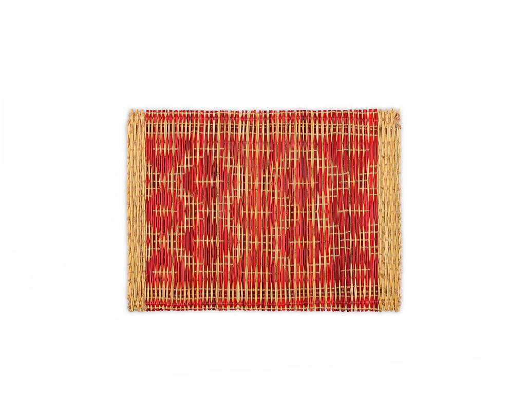 Red wicker placemats handmade in Morocco. 

Set of four wicker placemats with red decorations. These placemats are handwoven in Morocco and painted with natural dye. Each consists of four mats and they can be ordered in any quantity.