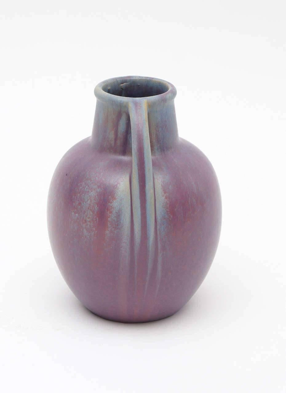 Rich progressive shades of lavender and blue on this early 20th century. Fulper vase in excellent condition. Faint discernible Fulper cipher on the base.