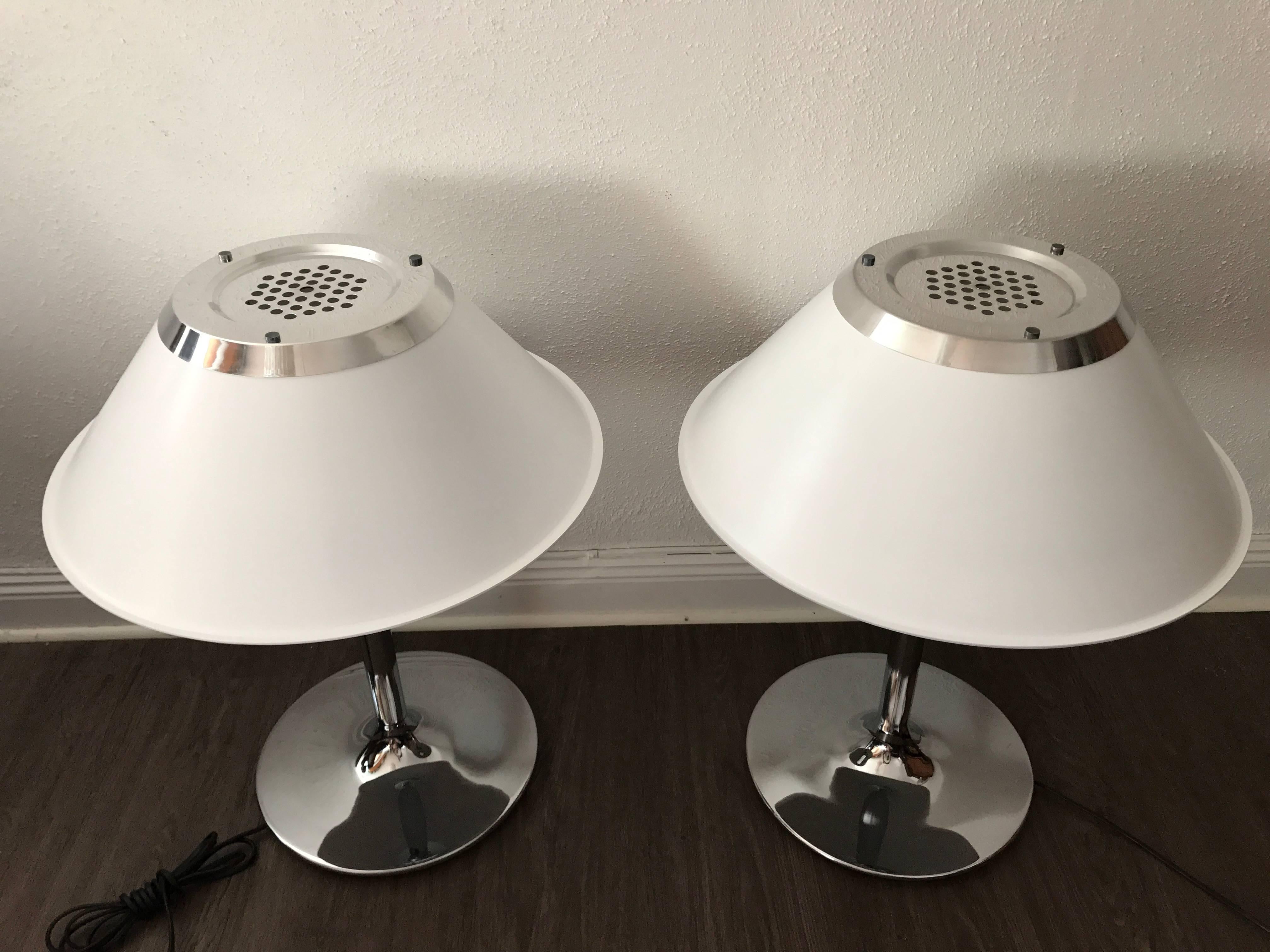 Pair of 1970 Swedish Atelje Lyktan "Mars" table lamps designed by Per Sundstedt,
A very nice pair of table lamps, the shades are made of plastic with an perforated aluminum top and the foot is made of chromed steel. This pair is in a