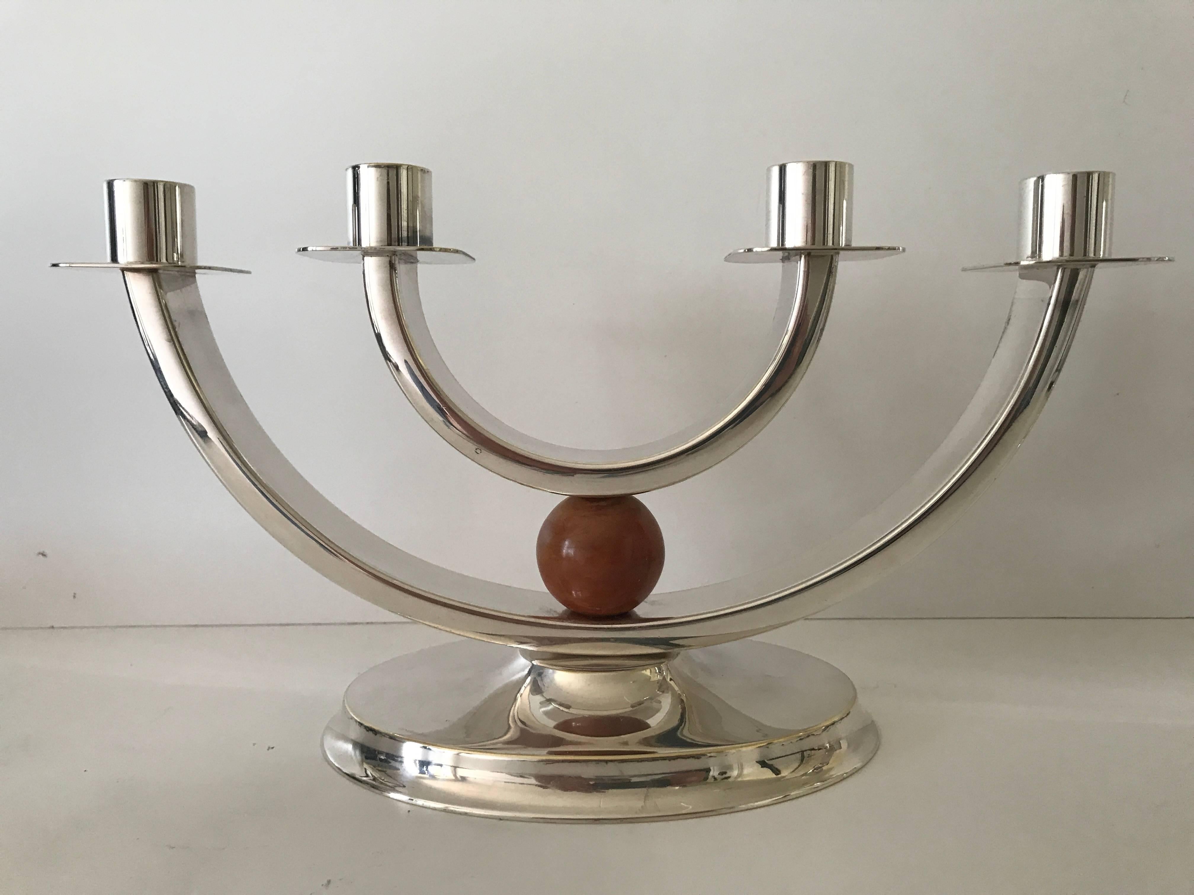 1930 Art Deco German bakelite silver plate candelabra F. W. Quist Württemberg.
This is a very rare pair of silver plate and bakelite candelabra made by F. W. Quist in Württemberg. After long research on the internet this pair is the only that we