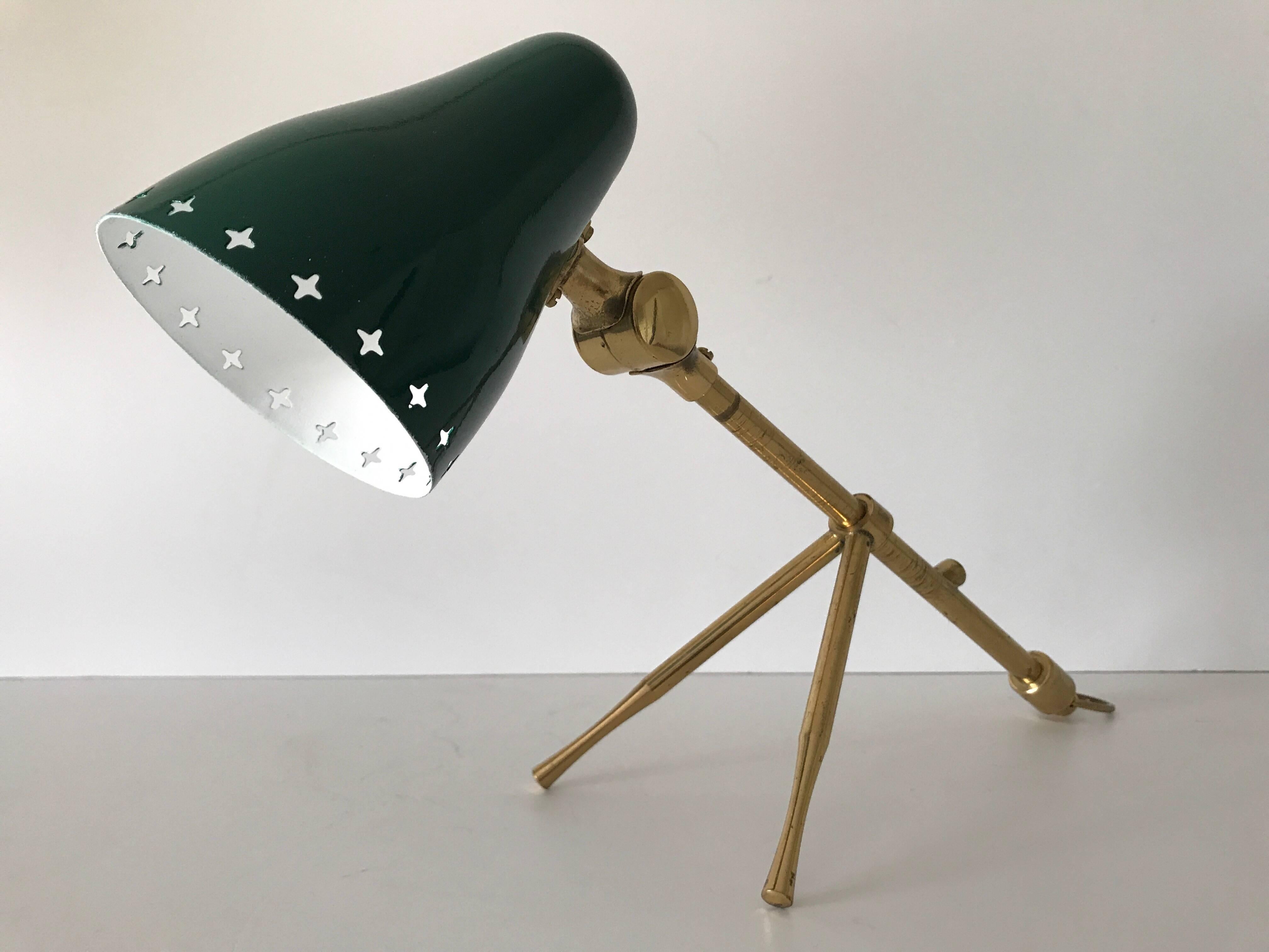 Swedish brass table and wall lamp Boris Lacroix style, 1950s. 
A very nice table and wall lamp, as it can be hung in the ring upside down as a wall sconce. It is in a very nice condition and it measures 35cm in length and 21cm in height when