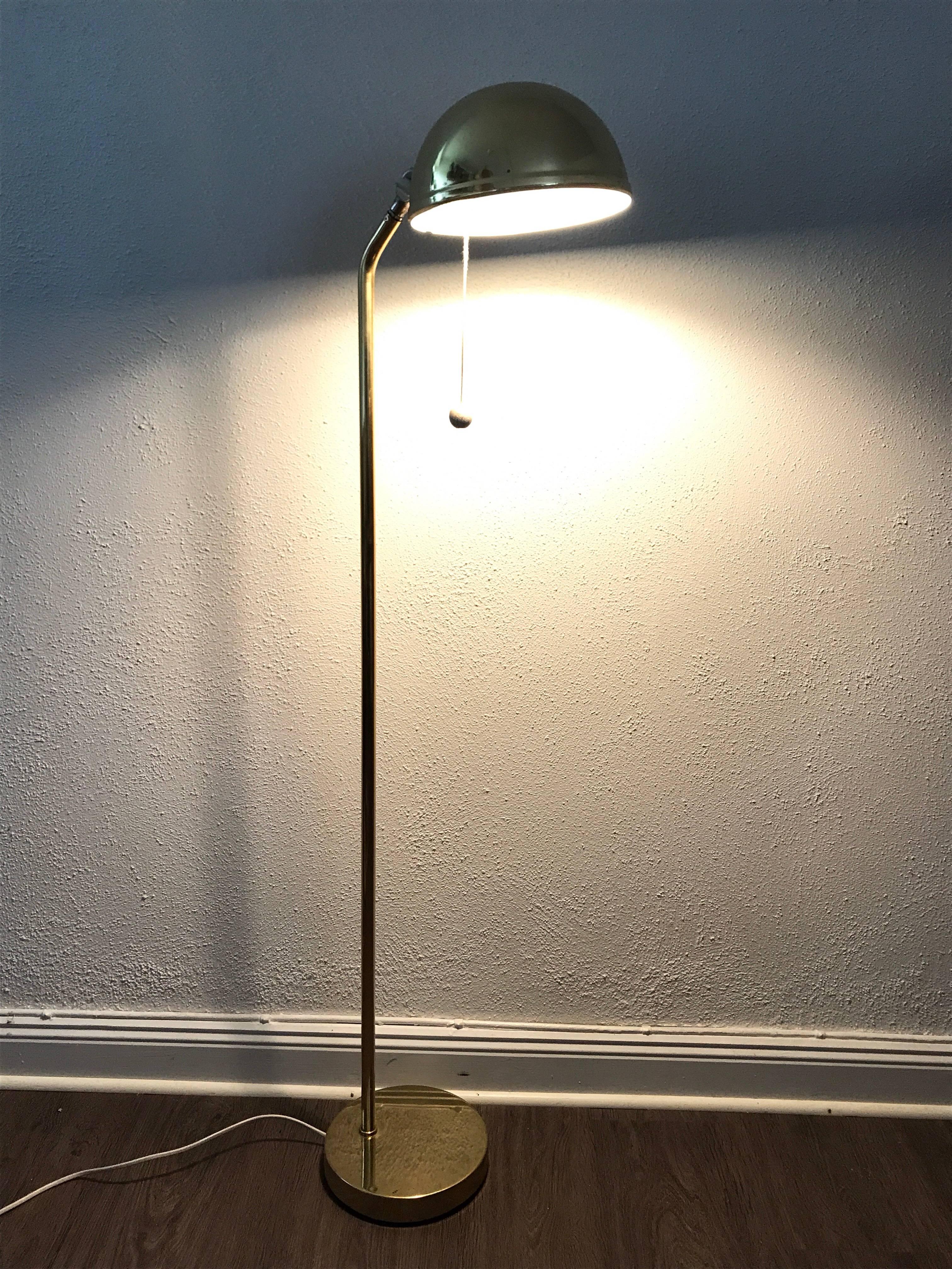 Pair of rare Danish Elit Brass Floor Lamps.  A very rare pair of Elit Brass floor lamps in top original condition manufactured in third quarter of the 20th c. 
The height is 115cm and the diameter of the base is 19cm. All electrical components have