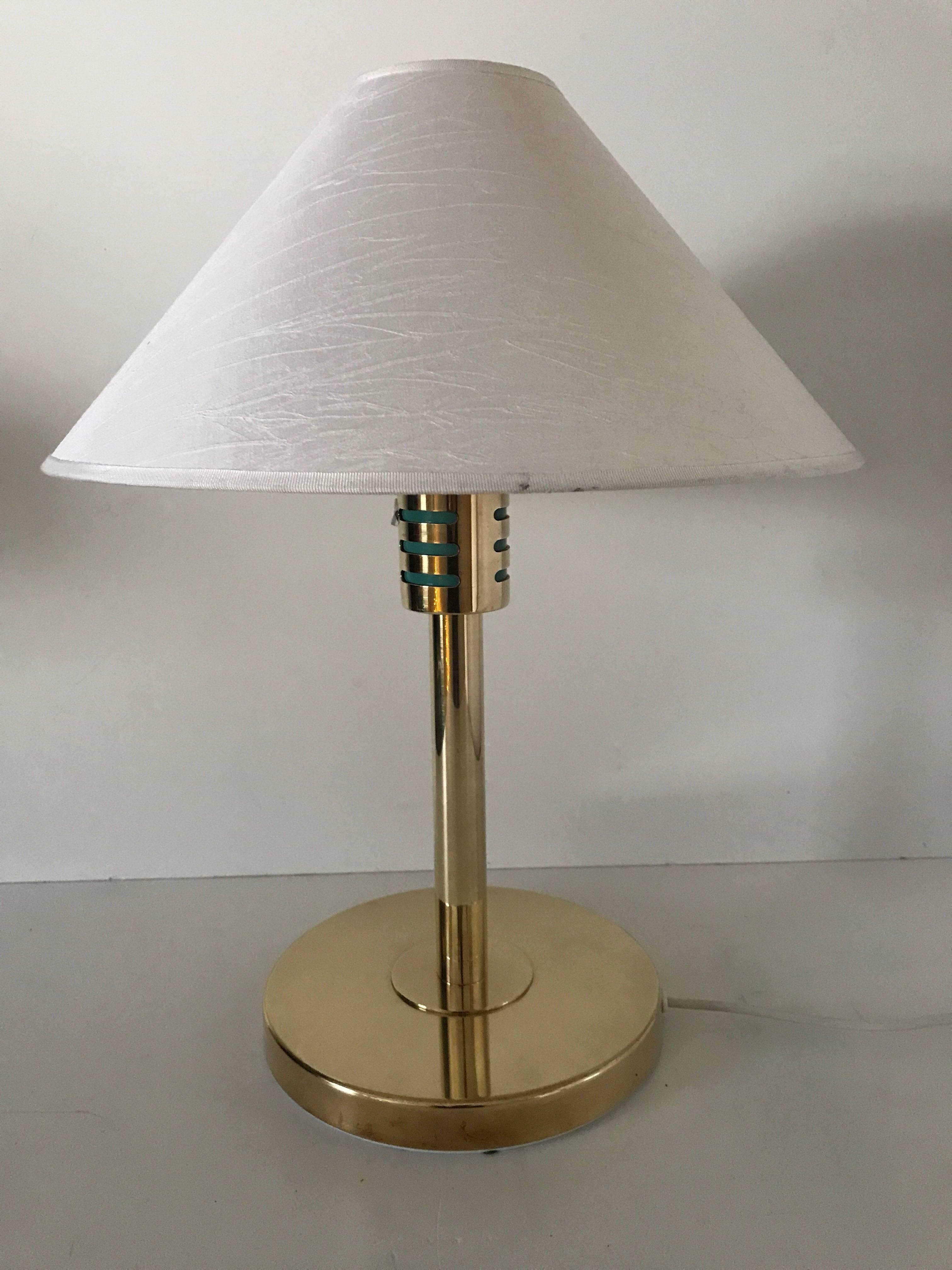 Rare Swedish Hans Agne Jakobsson Brass Table Lamp. A very beautiful and large table lamp in polished brass, the original shade is in a nice condition, you can also choose either a white or a beige additional shade that is include in the price. Note