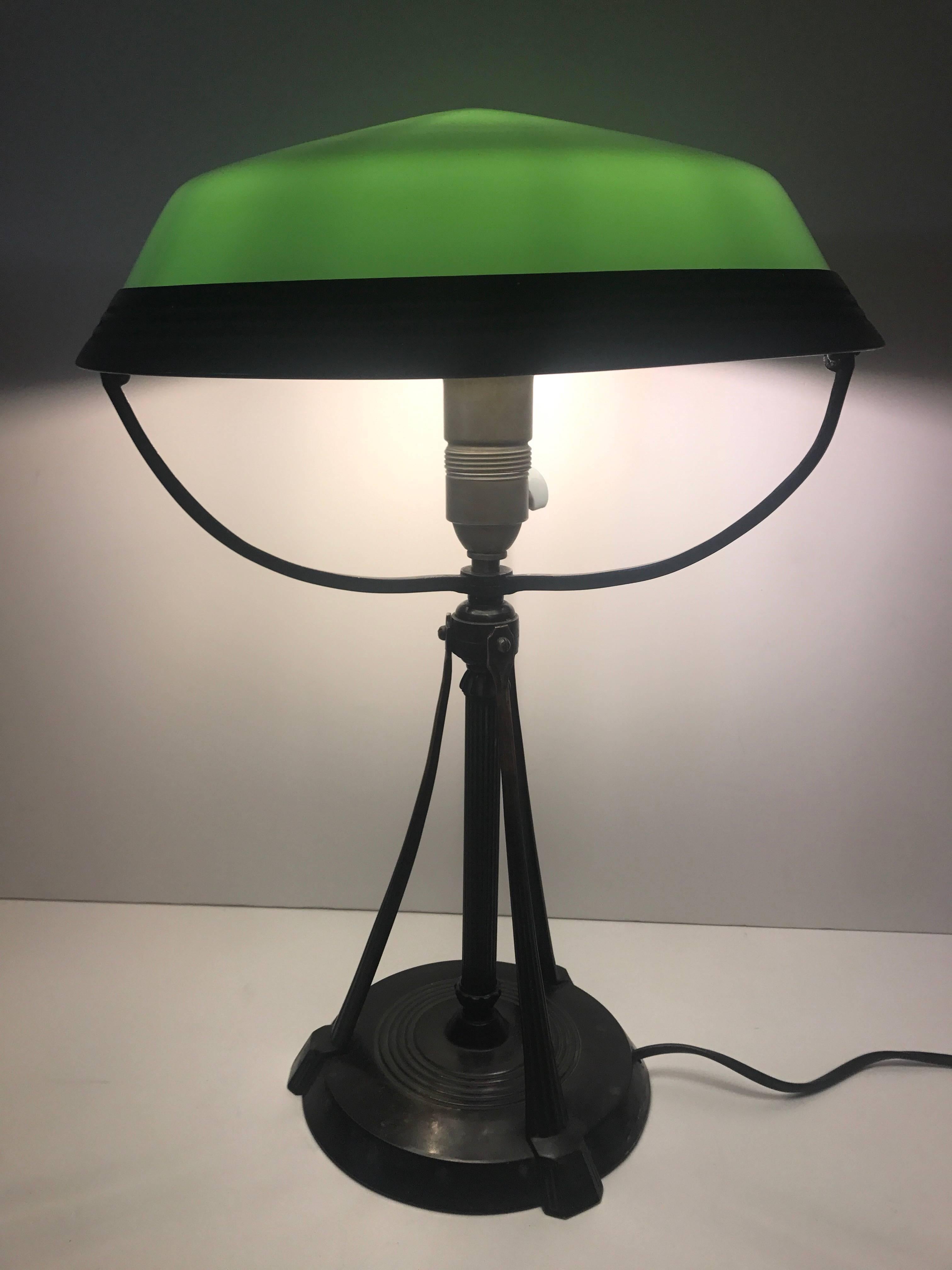 Swedish Art Deco Table Lamp Glass and Bronzepatinated Metal.
A very beautiful and large table lamp, most likely Swedish made of blown glass and speller that has been patinated to look like bronze. The lamp is in a very nice condition and all the