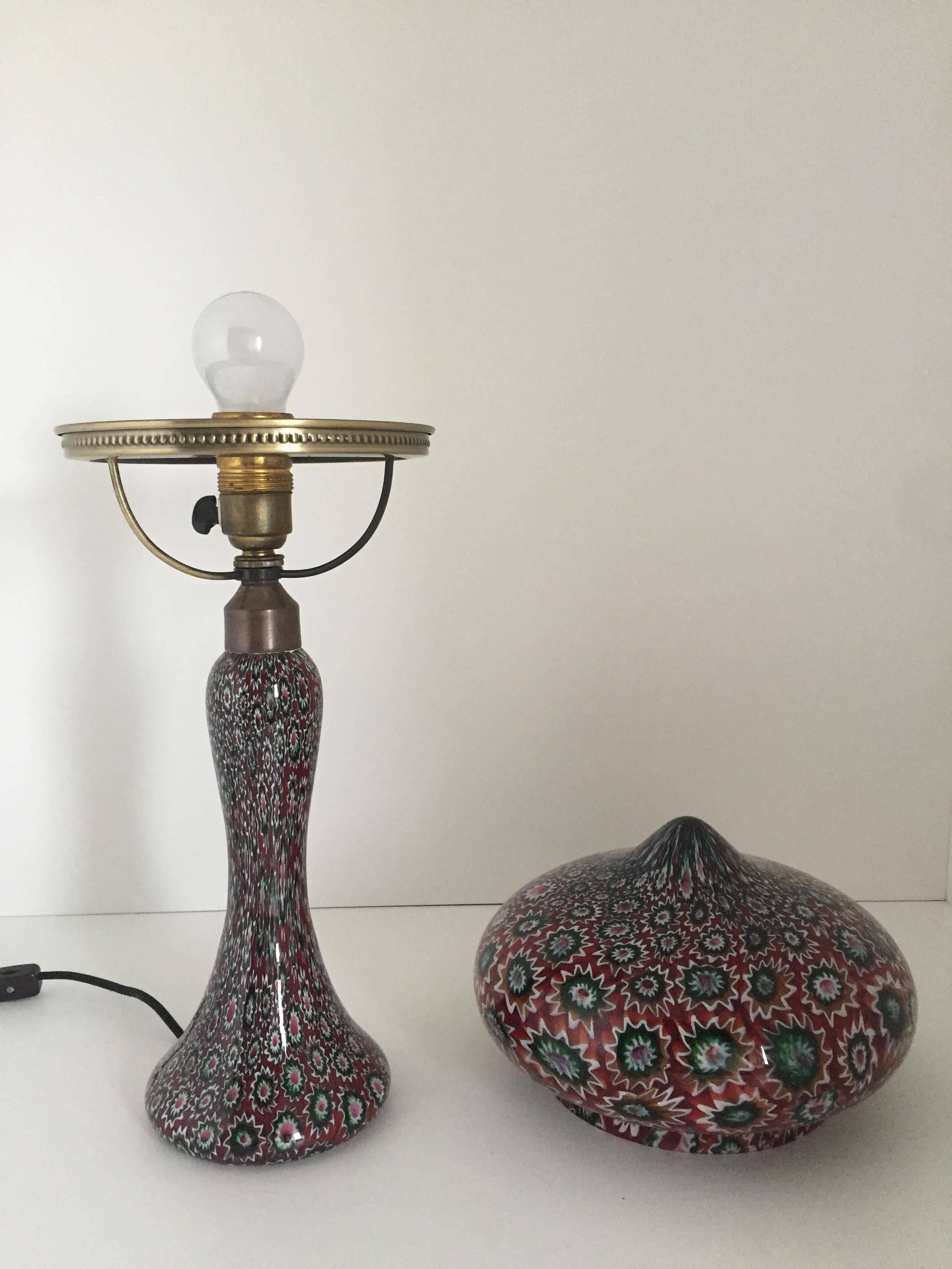 A rare and tall Italian Murano Fratelli Toso Millefiori lamp made, circa 1925. The lamp is in a pristine condition with new wired cords and without any cracks, chips or defects. Measures: The height is 51cm and the diameter of the shade is 23cm.