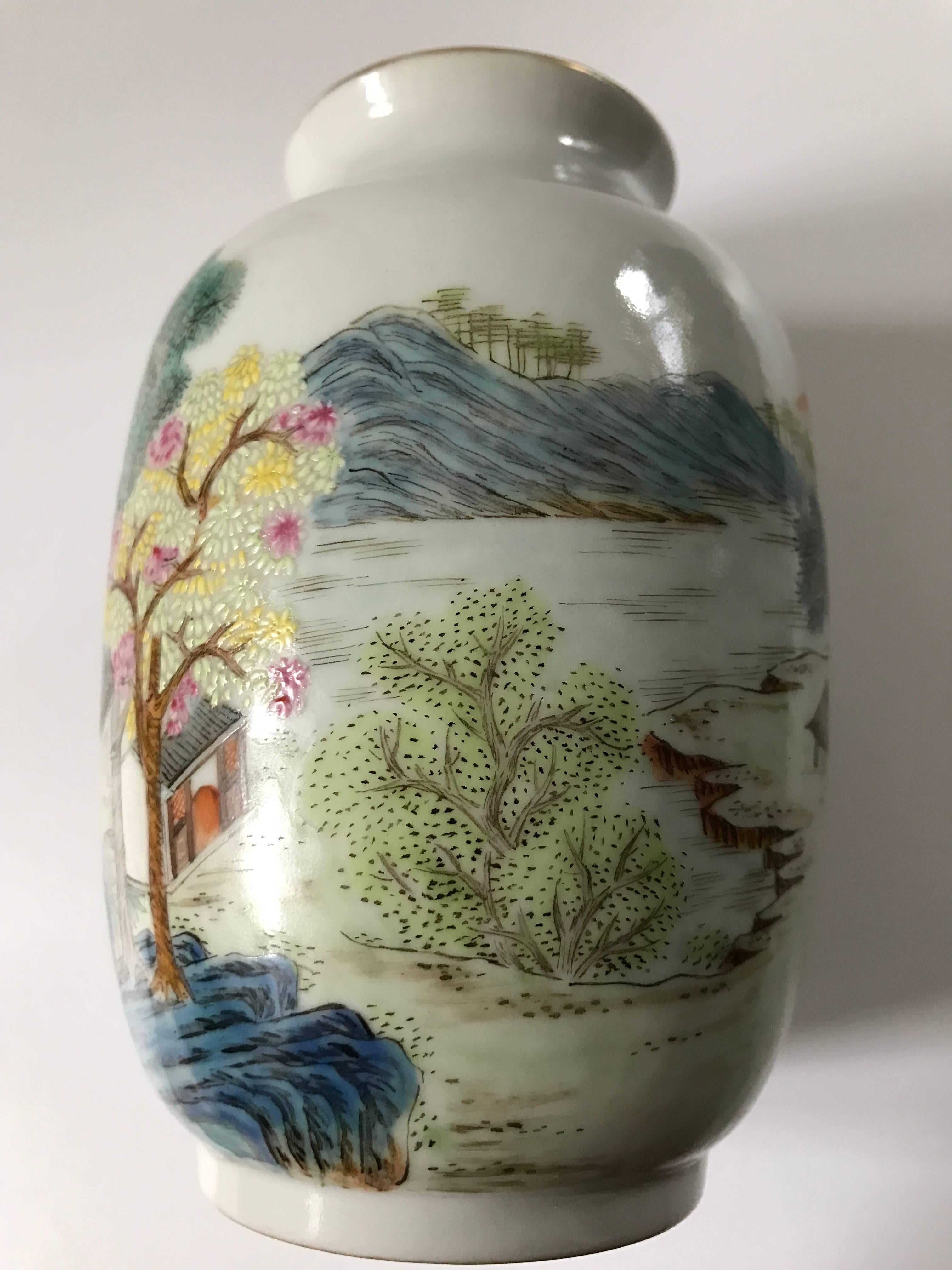 This vase is made during the Republic period during the first half of the 20th century and it is of such high quality, painted in the famille rose colors with incredible skill. The vase depicts mountains, houses, valleys and a landscape scene with