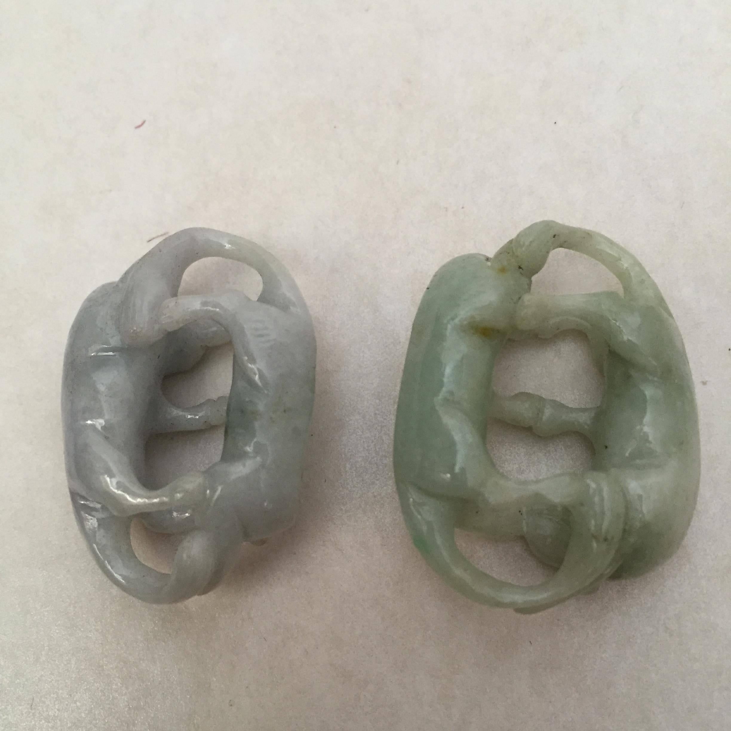 Carved 20th Century Chinese Green Jade and Lavender Jade Double Cat Pendants For Sale