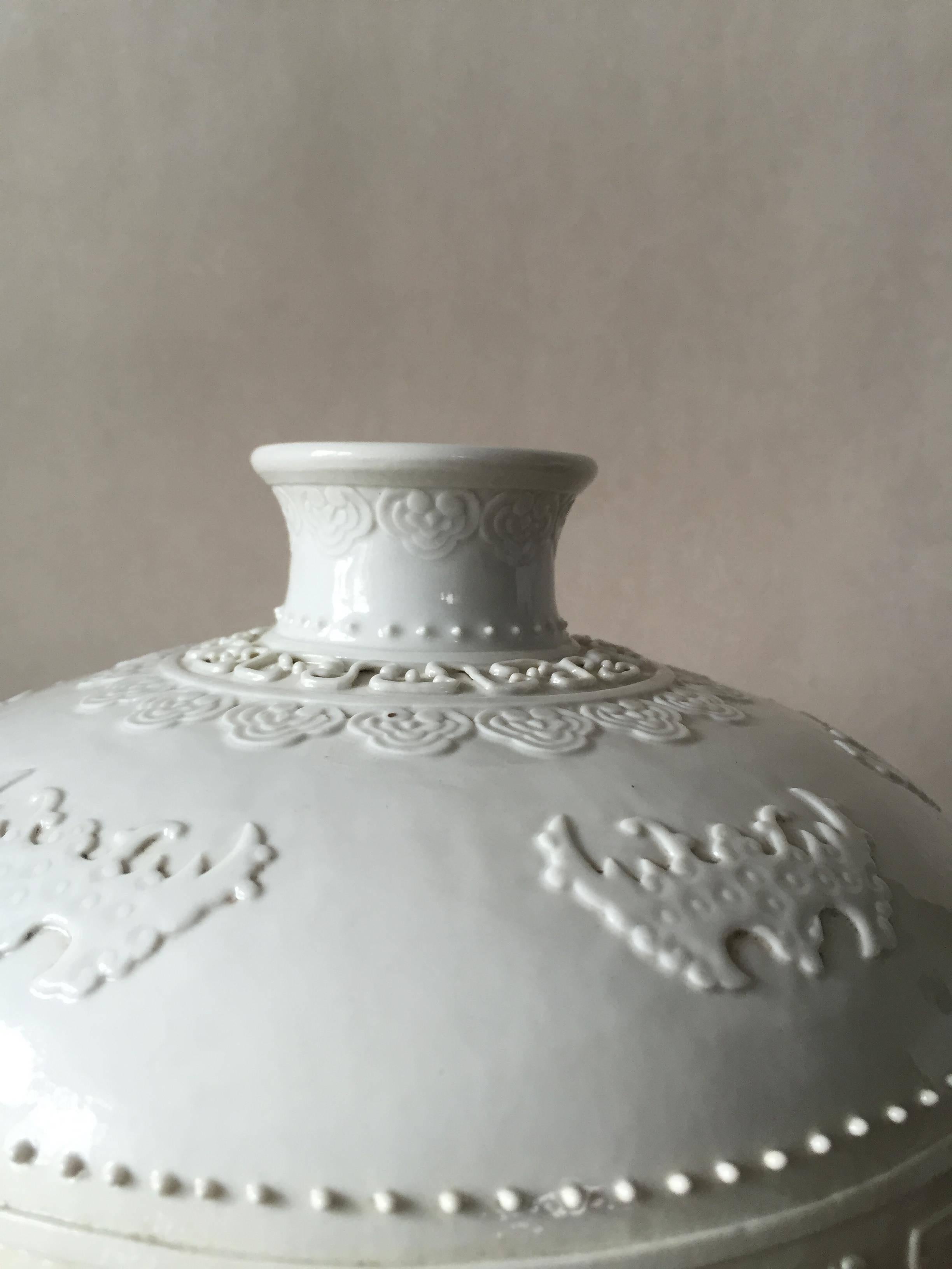 20th Century Chinese Chilong Relief Blanc de Chine Meiping Vase Qianlong Mark In Good Condition For Sale In Drottningholm, SE