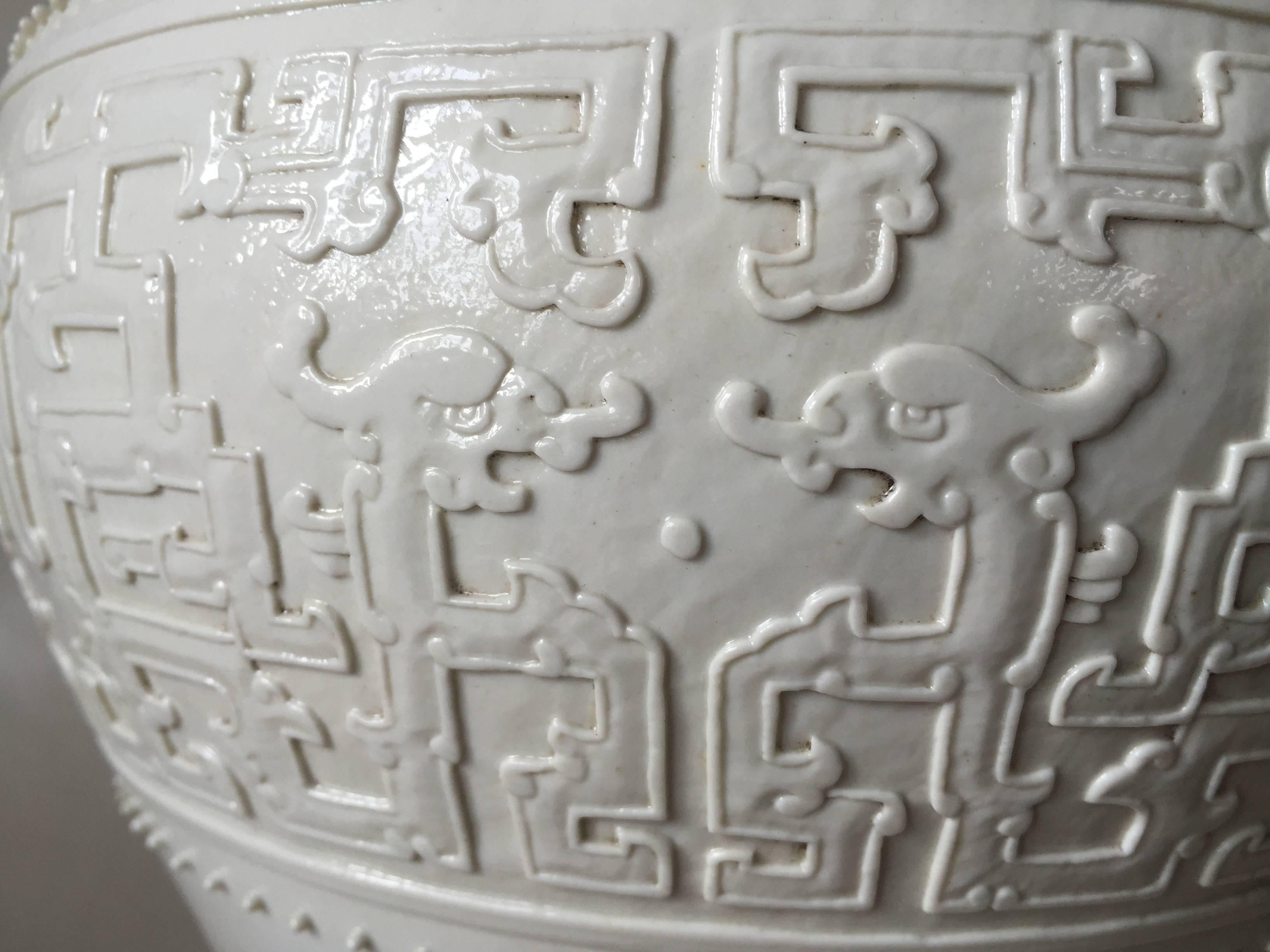Qing 20th Century Chinese Chilong Relief Blanc de Chine Meiping Vase Qianlong Mark For Sale