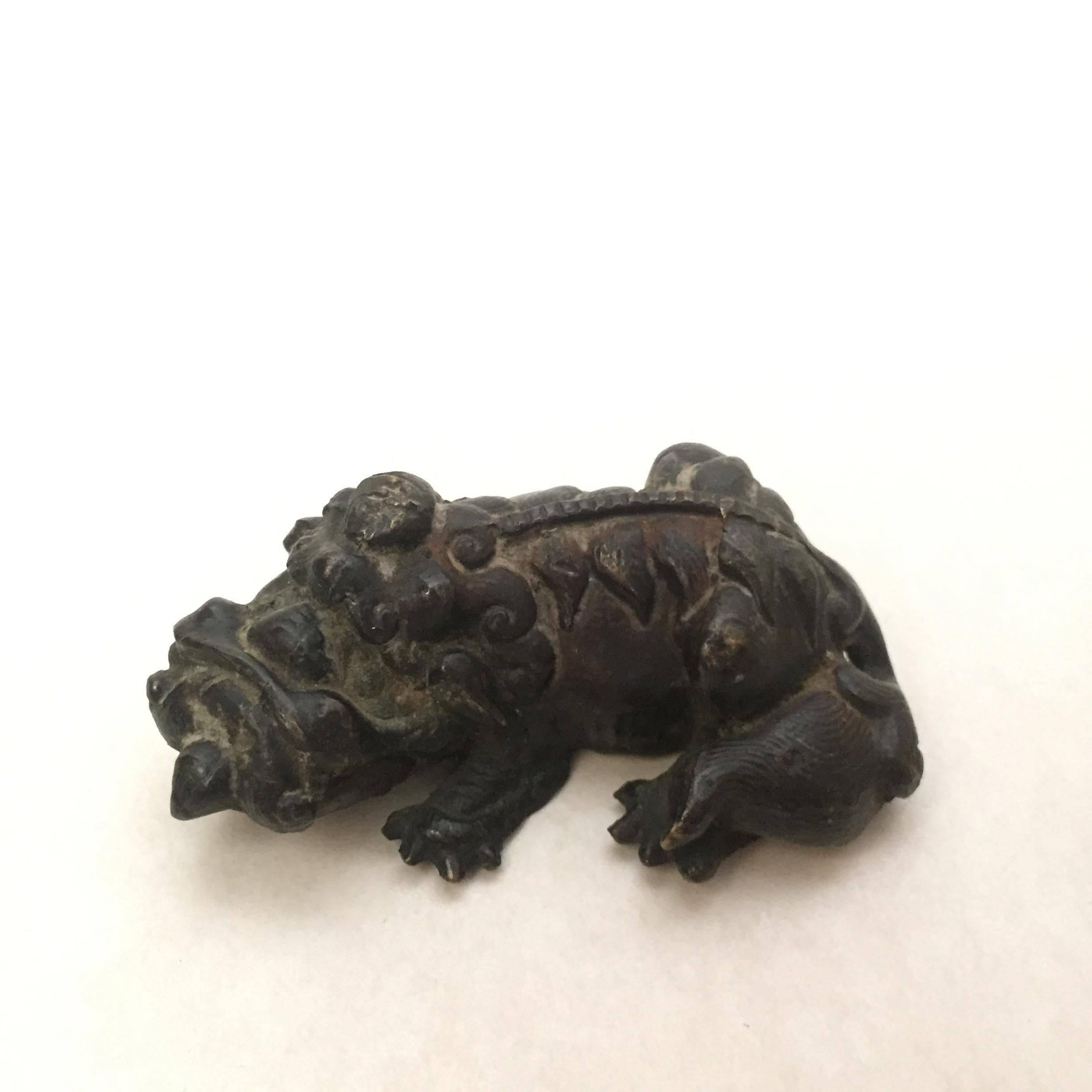 18th century Xuande mark Chinese bronze mythical beast paper weight.
A nice small bronze paperweight in the shape of a mythical beast. It has a Xuande mark to the base, but is of later age, most likely made during the 18th century. It measures