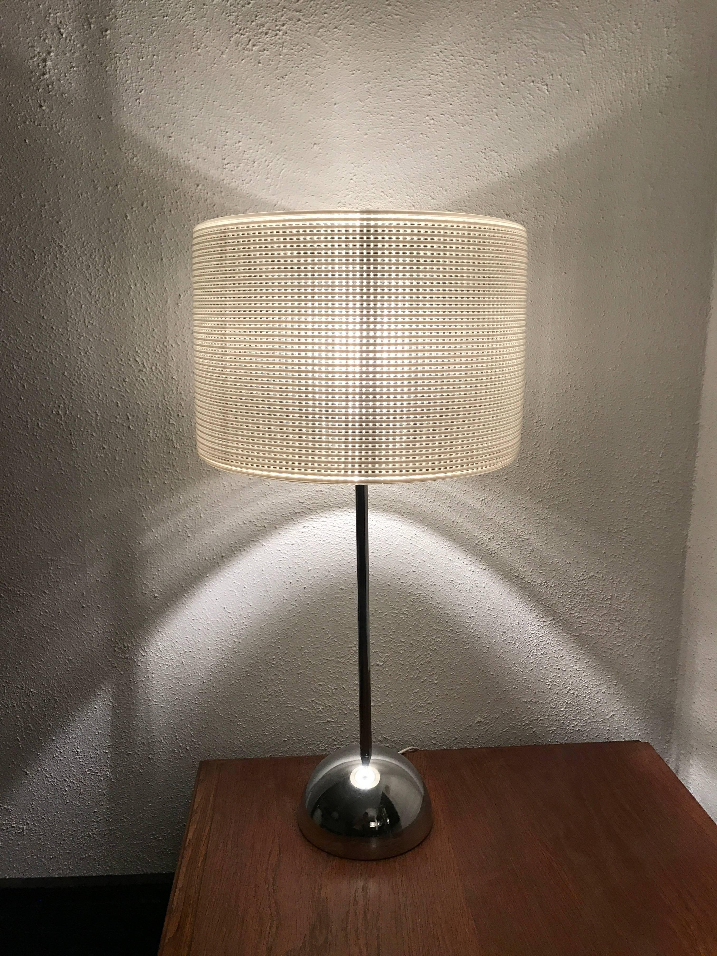 Large very rare 1960 Swedish Bergboms pair of chromed steel and plastic table lamps
Very rare table lamps made of plastic and chromed steel by Bergboms in the early 1960s. They are in a fantastic condition with original shades that gives a