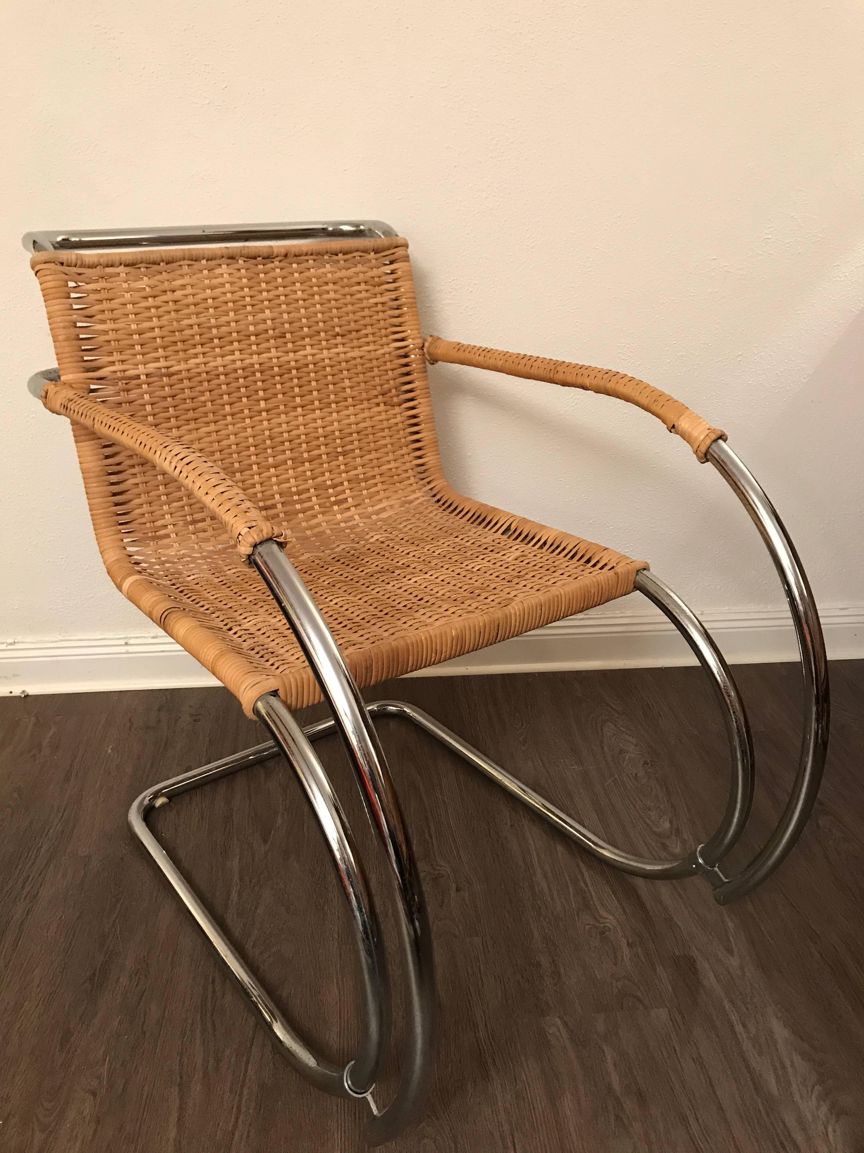 Pair of mid-20th century Mies van der Rohe MR20 Rattan chrome armchairs.
These chairs are most likely made in the mid-20th century. They will be in a excellent original condition and the rattan arm rests will be totally restored to original top