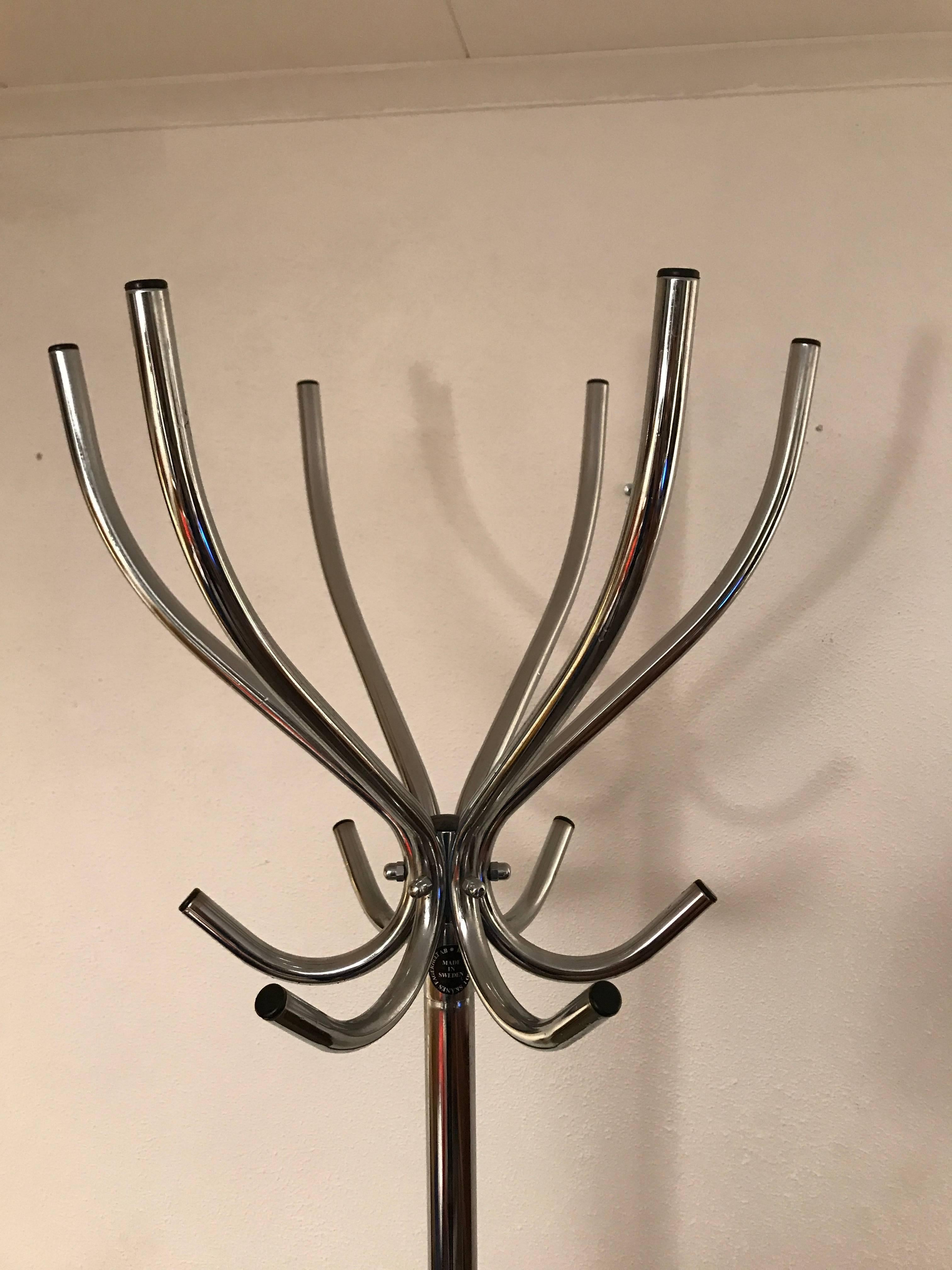 Swedish 1960 Chrome Steel Coat Tree Stand. A very nice chrome steel coat hanger stand, 182 cm in height with sic hooks and hat hangers. 