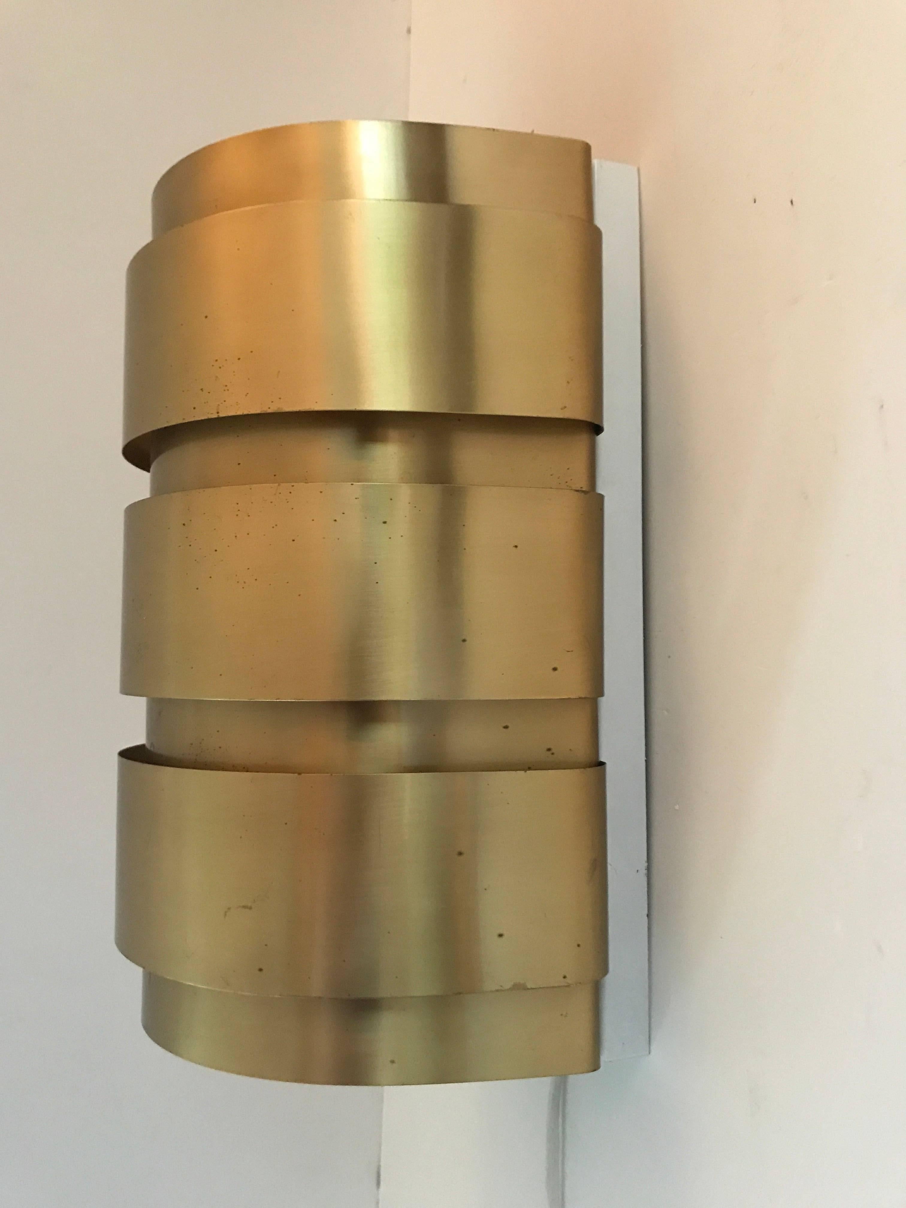 Pair of Swedish Hans-Agne Jakobsson V 155 brass wall sconces wall lamps, 1960.
They are in top condition without any damages or flaws. They measure 28cm in height and 17cm in width.
The electric installations in all lamps sold by us are thoroughly