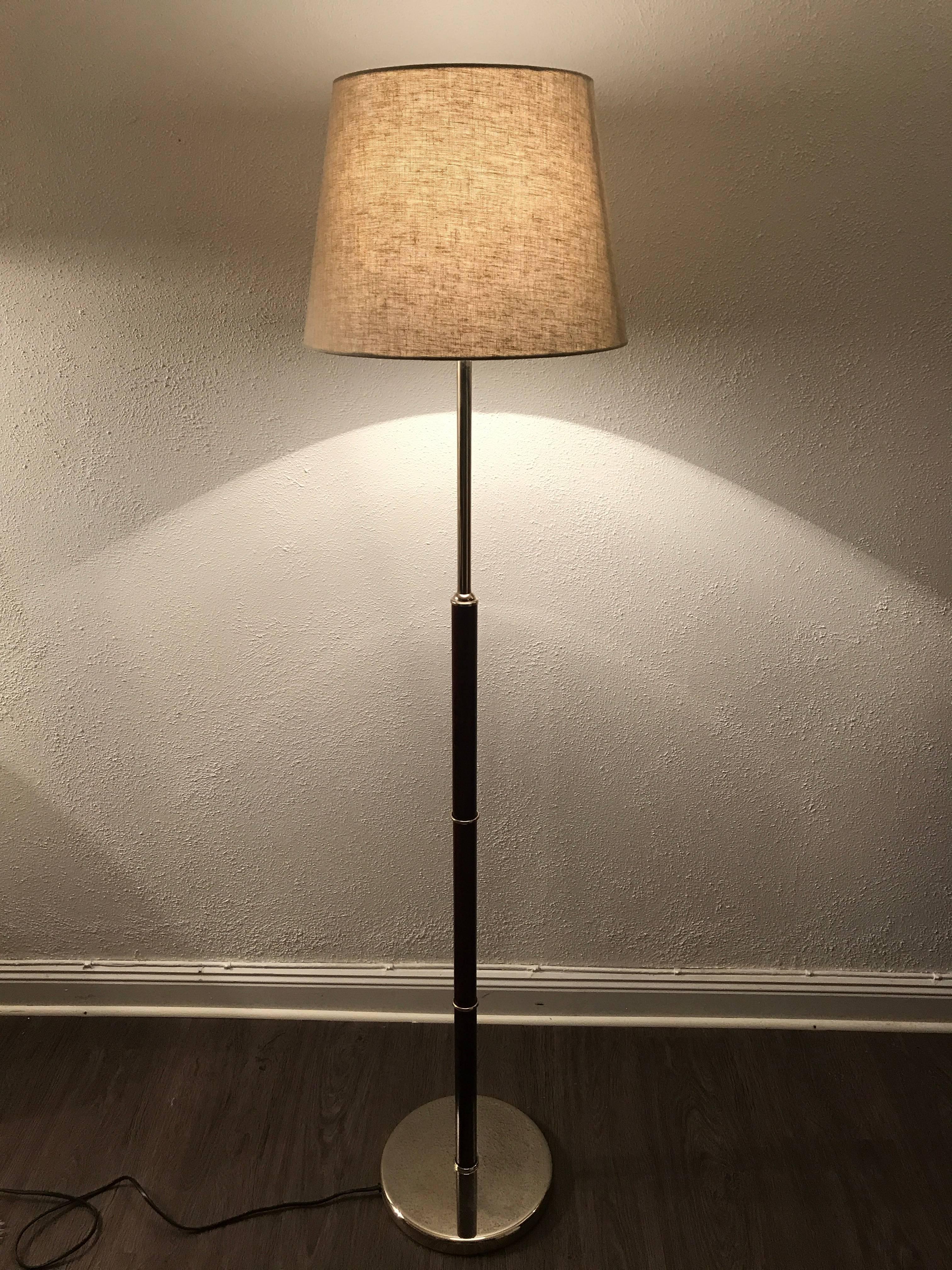 Rare Swedish cherrywood and steel floor lamp made by Belid AB, 1980.
This rare floor lamp was made exclusively for the SAS Radison Hotel in Gothenburg in the early 1980s we have a total of 16 lamps for sale. We have replaced the original shades due