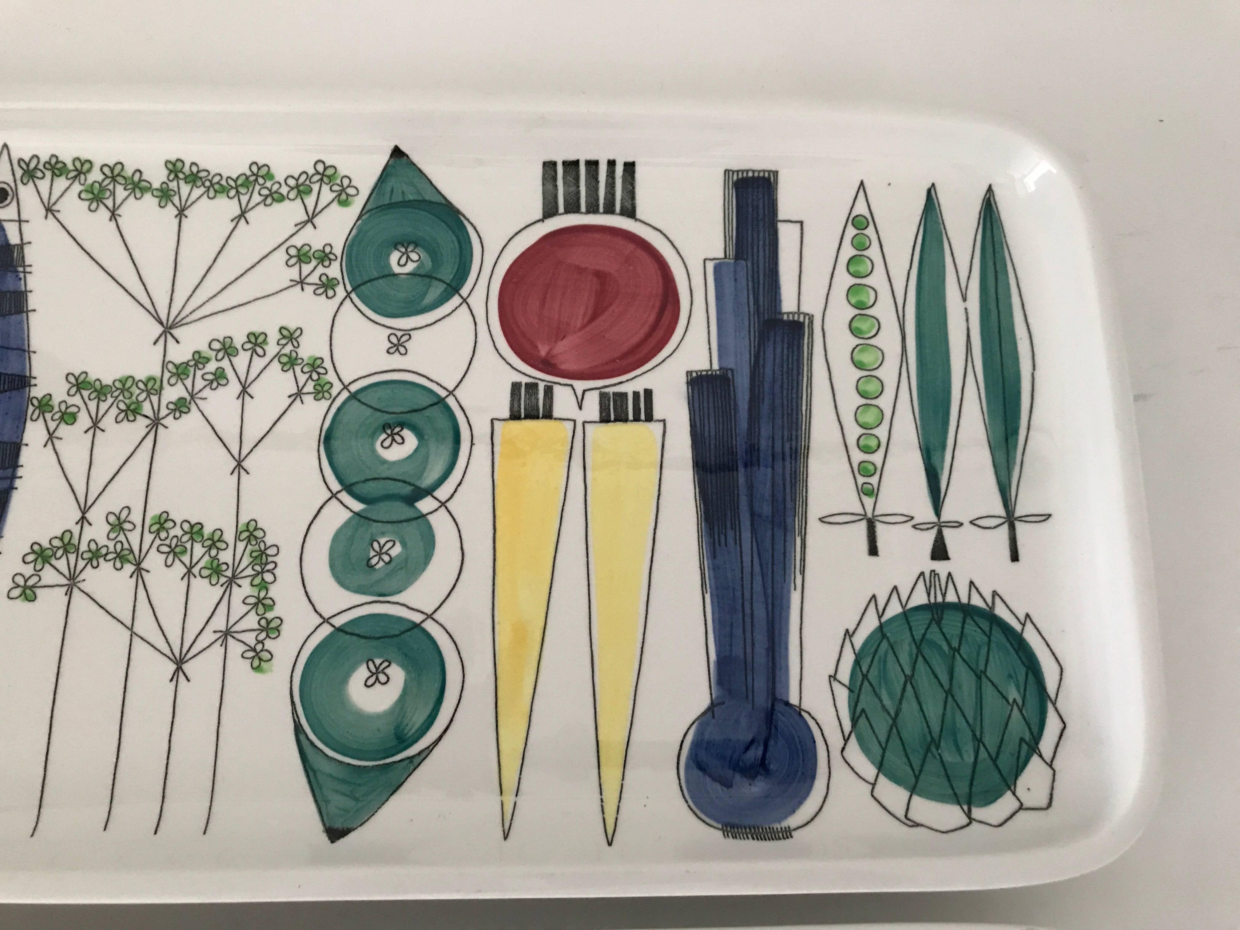 Swedish Rörstrand and Marianne Westman Picknick porcelain tray two available.
A beautiful porcelain tray made at the high end porcelain factory of Rörstrand. This series called Picknick is designed by one of the most popular porcelain designers