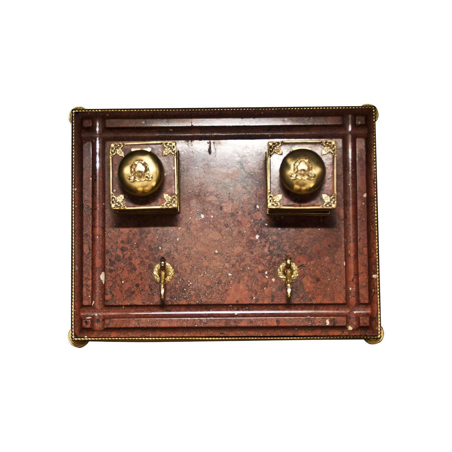 A beautiful double inkwell mounted on a red marble from Verona base, resting on four gilt bronze pad feet. 

This product is located and shipped from Italy.

This artwork is shipped from Italy. Under existing legislation, any artwork in Italy