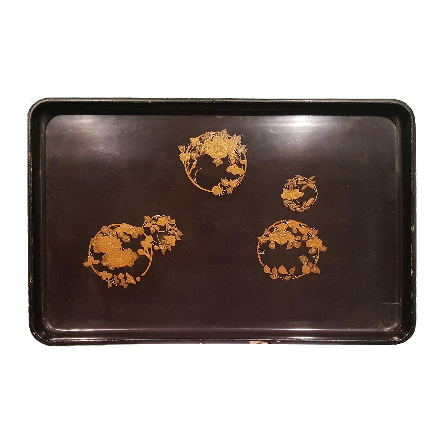 Beautiful black Japanese wooden tray with some polychrome and gold decorations in front side.
This product is located and shipped from Italy.