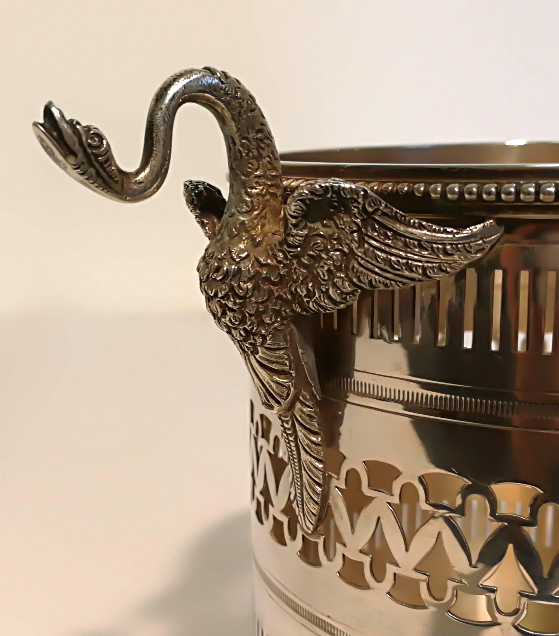 Beautifully decorated silver wine cooler with swan handles. Nicely perforated silver, Italian goldsmithery.