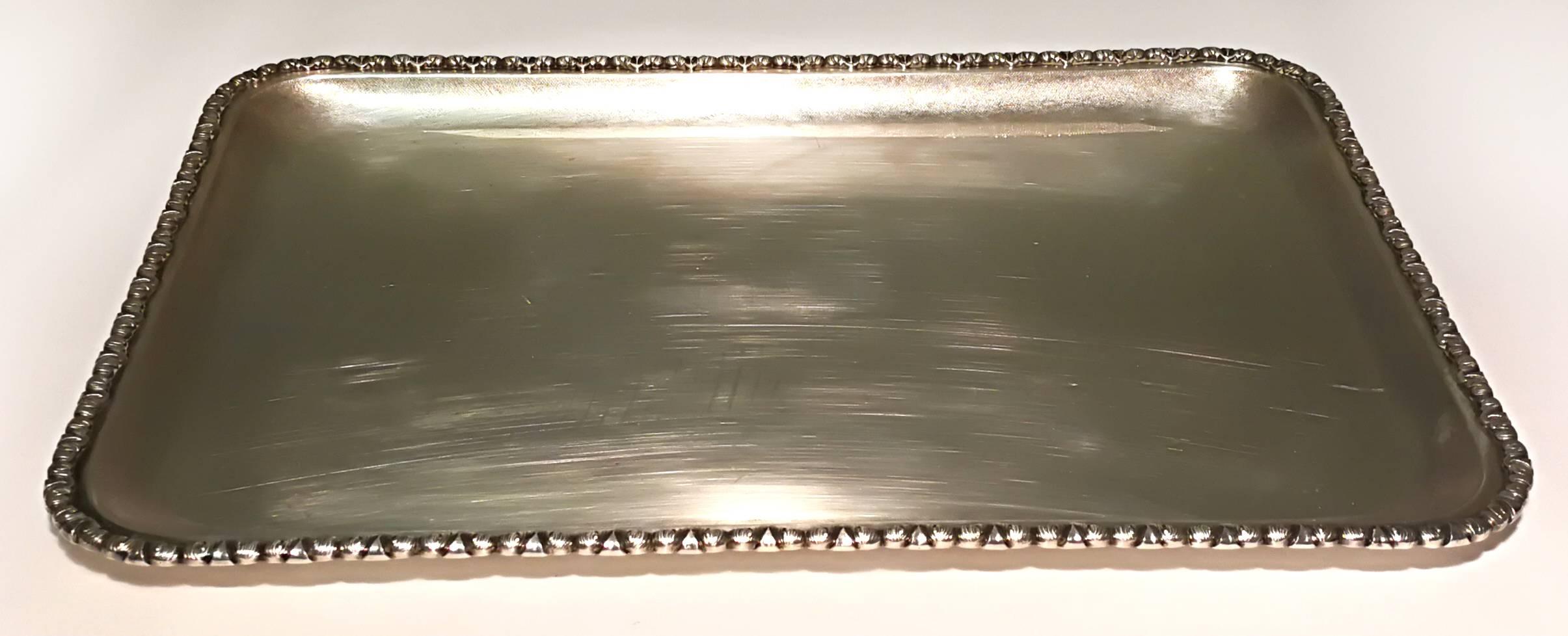 Very nice silver tray with decorated edge.

Good conditions.