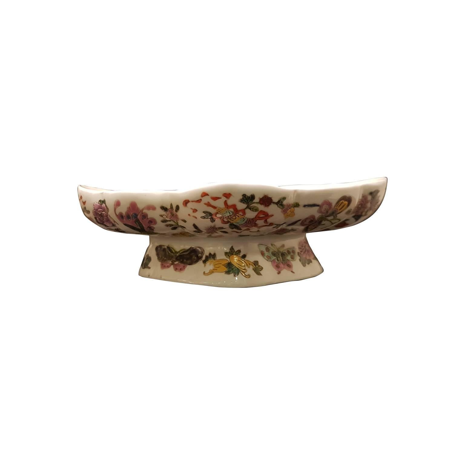 Chinese bowl painted in bright enamels with beautiful decorations of flowers, leaves and butterflies. Chinese red mark at the bowl bottom. 

This product is located and shipped from Italy.