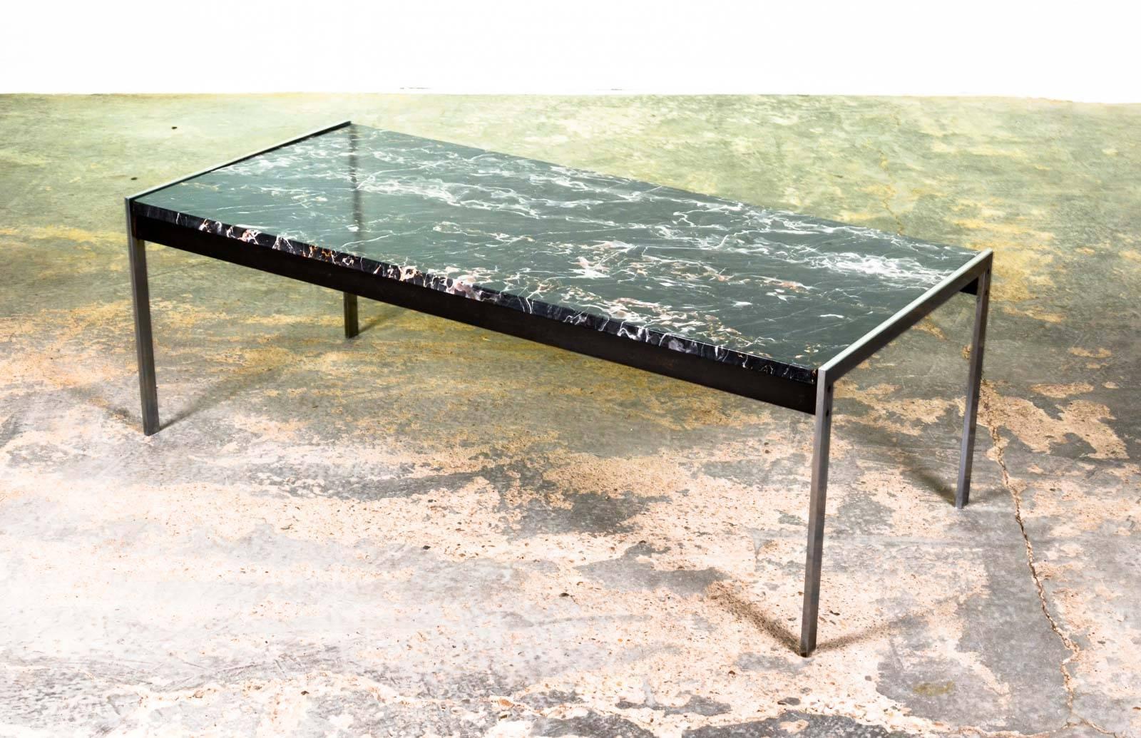 Minimalistic Dutch design rectangle black marble coffee or cocktail table is part of the 020 series designed by Kho Liangh Ie for Artifort. The beautiful tabletop features white and rose veins in the black marble and rests in a refined brush steel