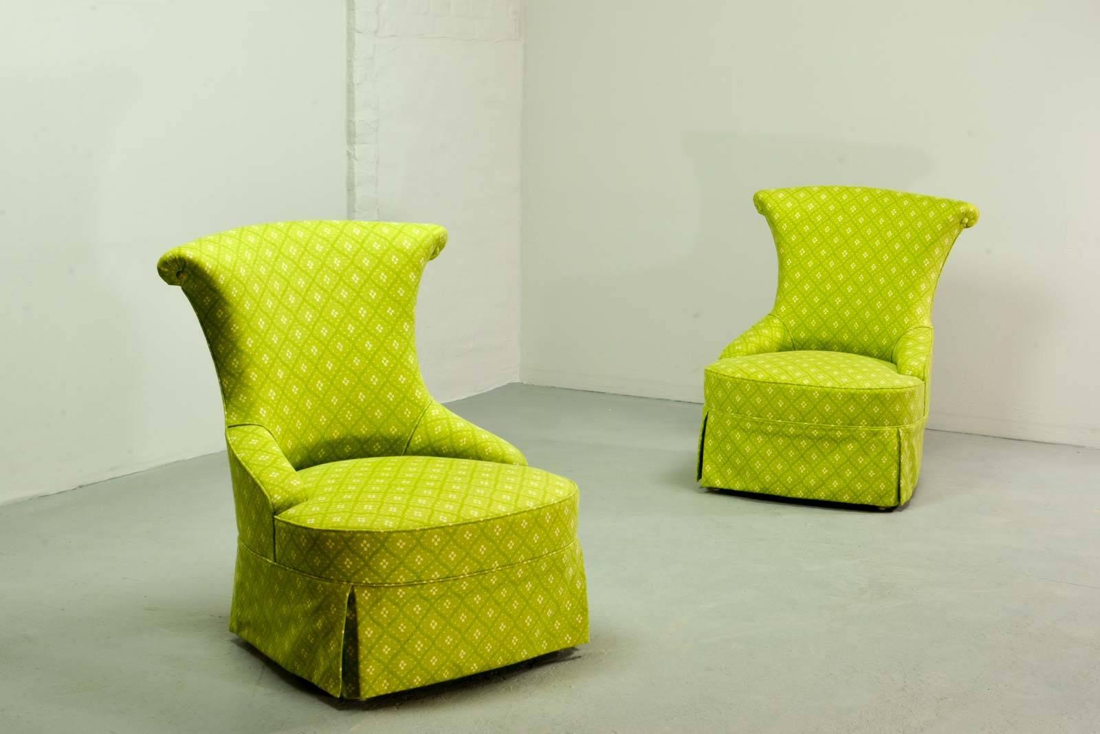 An exclusive pair of boudoir chairs in a bright lime colored high quality fabric. The refurbishment of the chairs is done with great craftsmanship and eye for detail. This stunning pair is in absolute excellent condition!