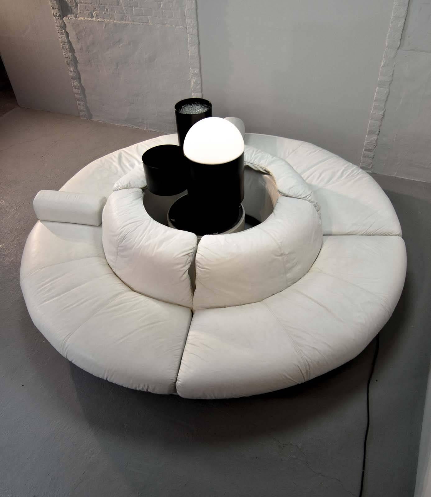 Rare and fantastic circular white leather sectional Italian sofa. This sofa consists of four identical quarter elements in a soft white leather upholstery. The four elements can be applied as stand alone sofas, but make a stronger appearance as a