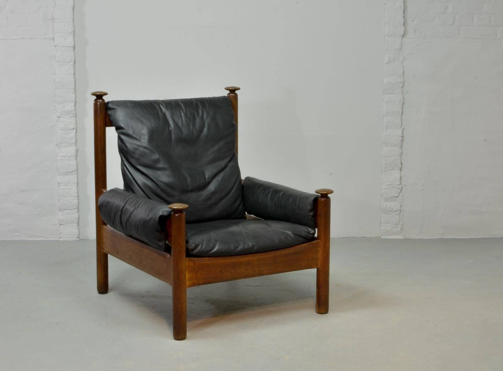 Sturdy Midcentury Black Leather Scandinavian Lounge Chair with Ottoman, 1960s In Good Condition In Maastricht, NL