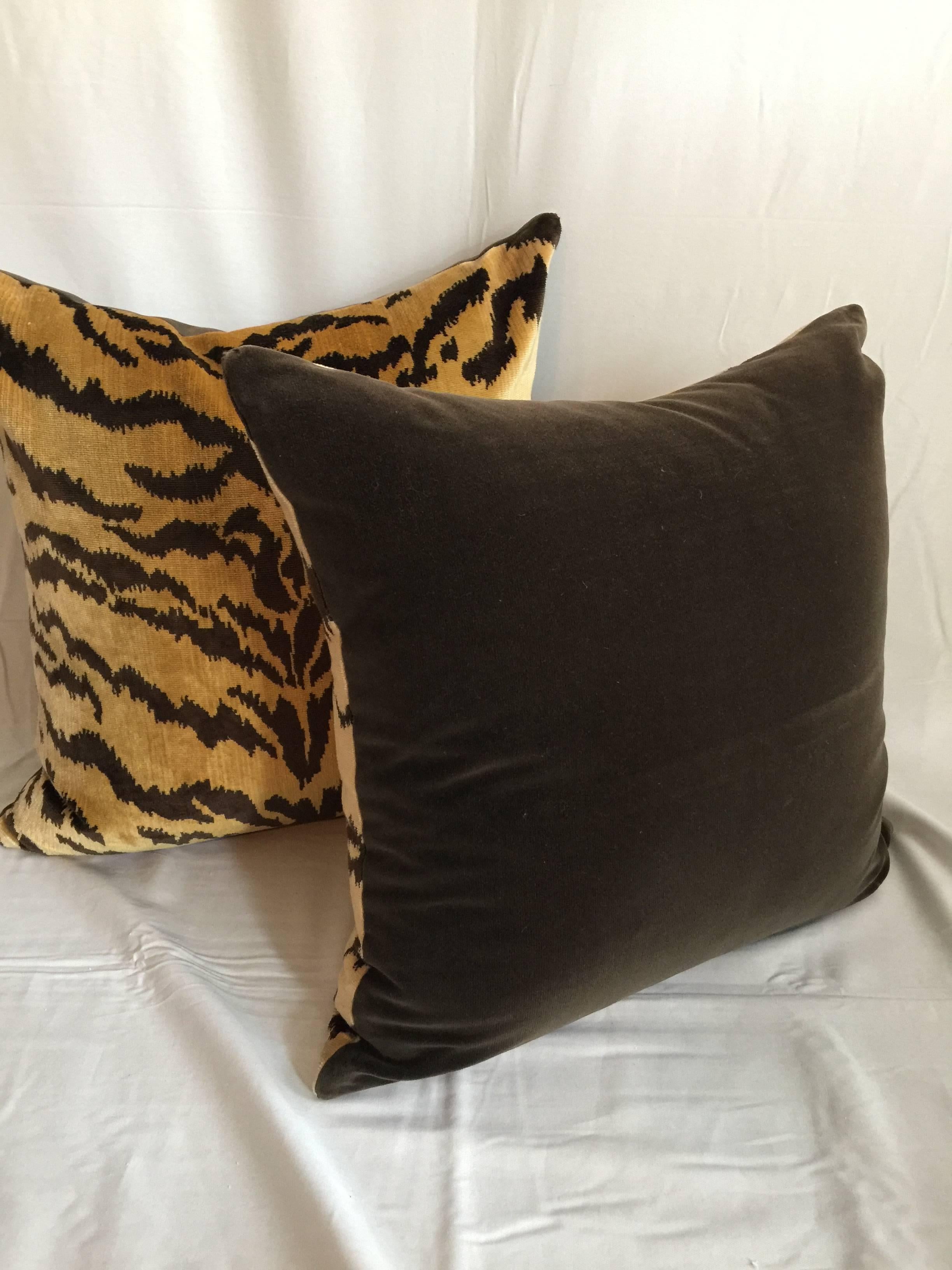 Scalamandre Le Tigre silk velvet pillows. Fabric woven in Venice, Italy. This custom pair is backed in dark brown velvet with a knife-edge detailing. Hidden zipper detailing. Fills are 30% down/70% feather.
  