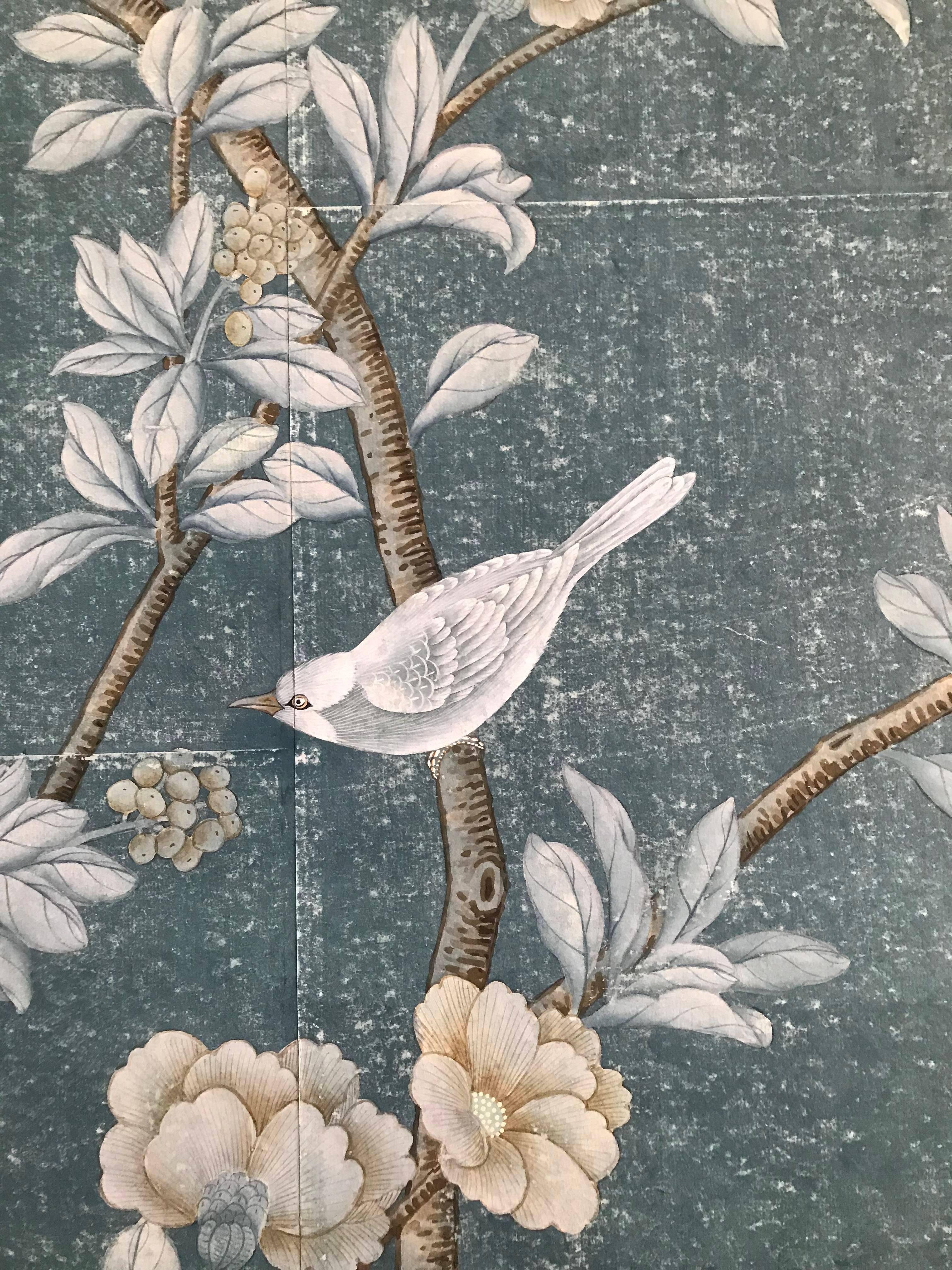 Gorgeous hand-painted chinoiserie panel of unknown manufacturer on paper with gilded bamboo frame.
