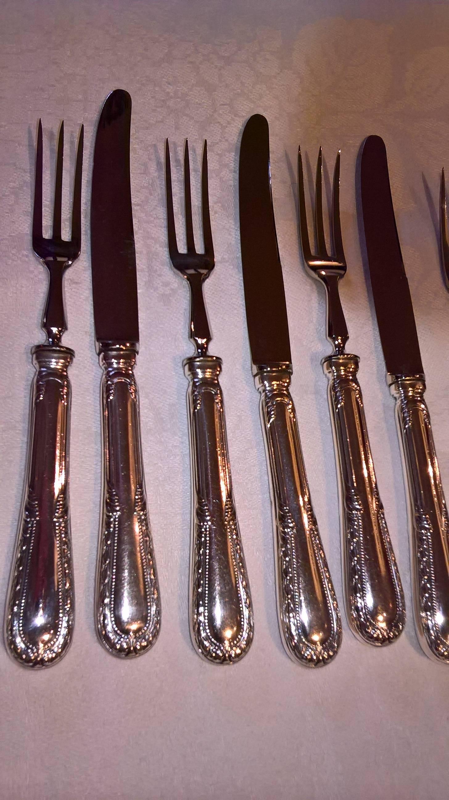 German dessert fruit set of six knives and six forks from 1890. Decor Ludwig XVI. This decor ist still available at Koch and  Bergfeld for the complete menue set.
Handmade by Koch & Bergfeld Bremen/Germany. All pieces stamped 800 and hallmark