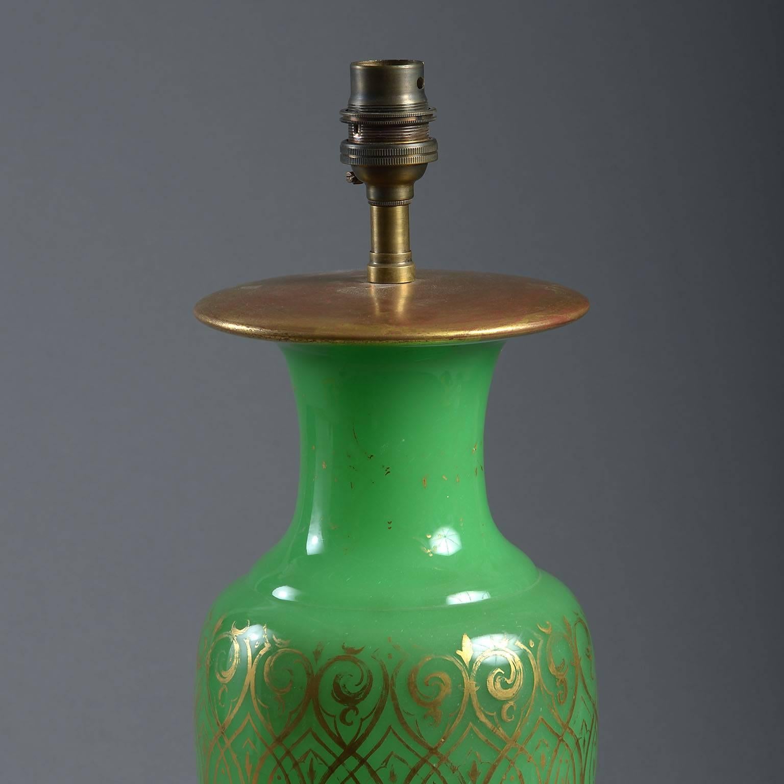 The green glass bodies of baluster form, finely decorated with gold arabesque decoration. With giltwood covers and standing on giltwood bases fitted with braided silk cable.

circa 1840
Origin: France

Measure: H 15
D 5.5.