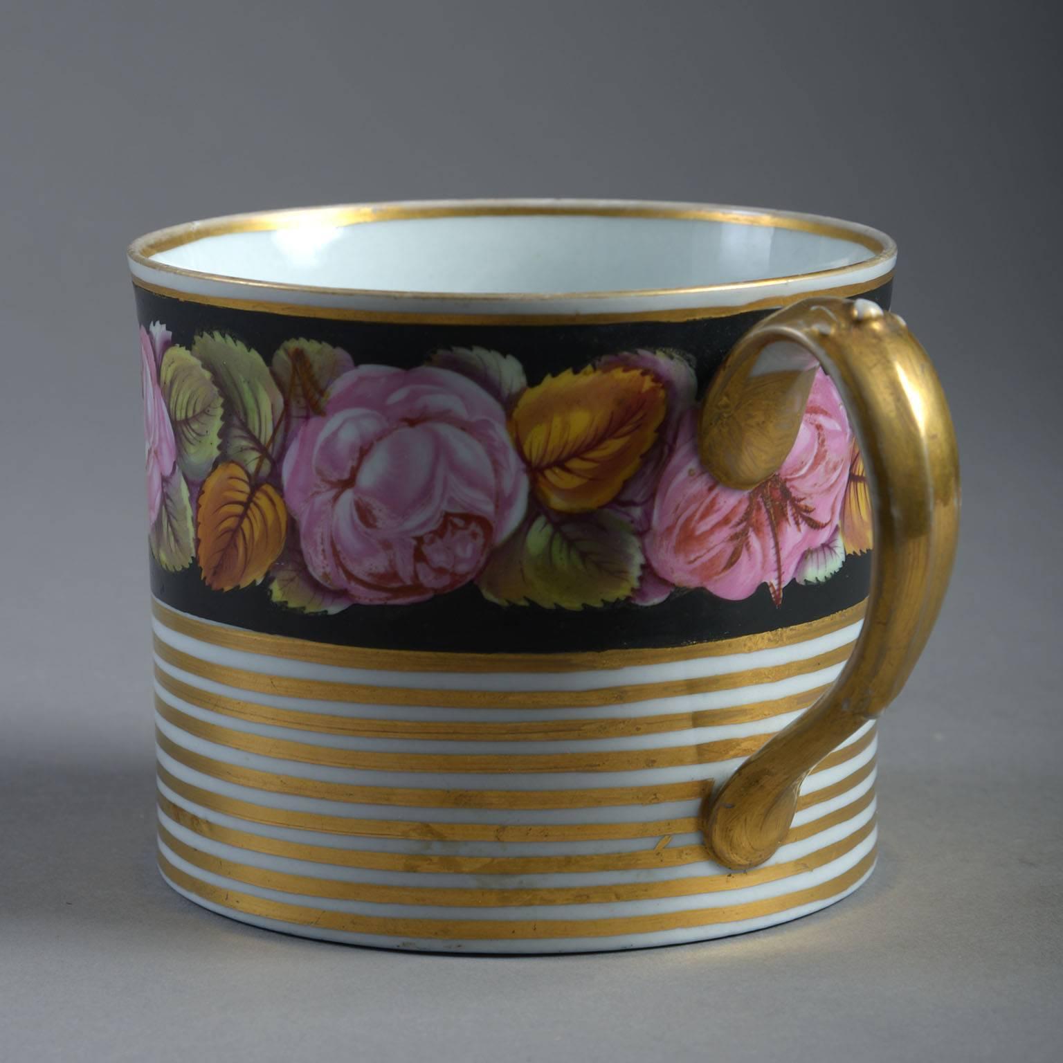 Decorated with a band of hand-painted flowers on a black ground above horizontal gilded stripes. 


English, probably Derby, circa 1810.


