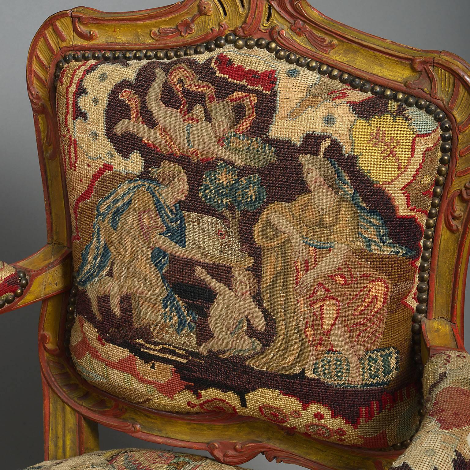 Pair of 18th century Bavarian painted armchairs
With stuffed cartouche-shaped backs, padded arms and stuffed seats all covered in 18th century needlework, the frames and cabriole legs carved with Rococo scrollwork; painted decoration